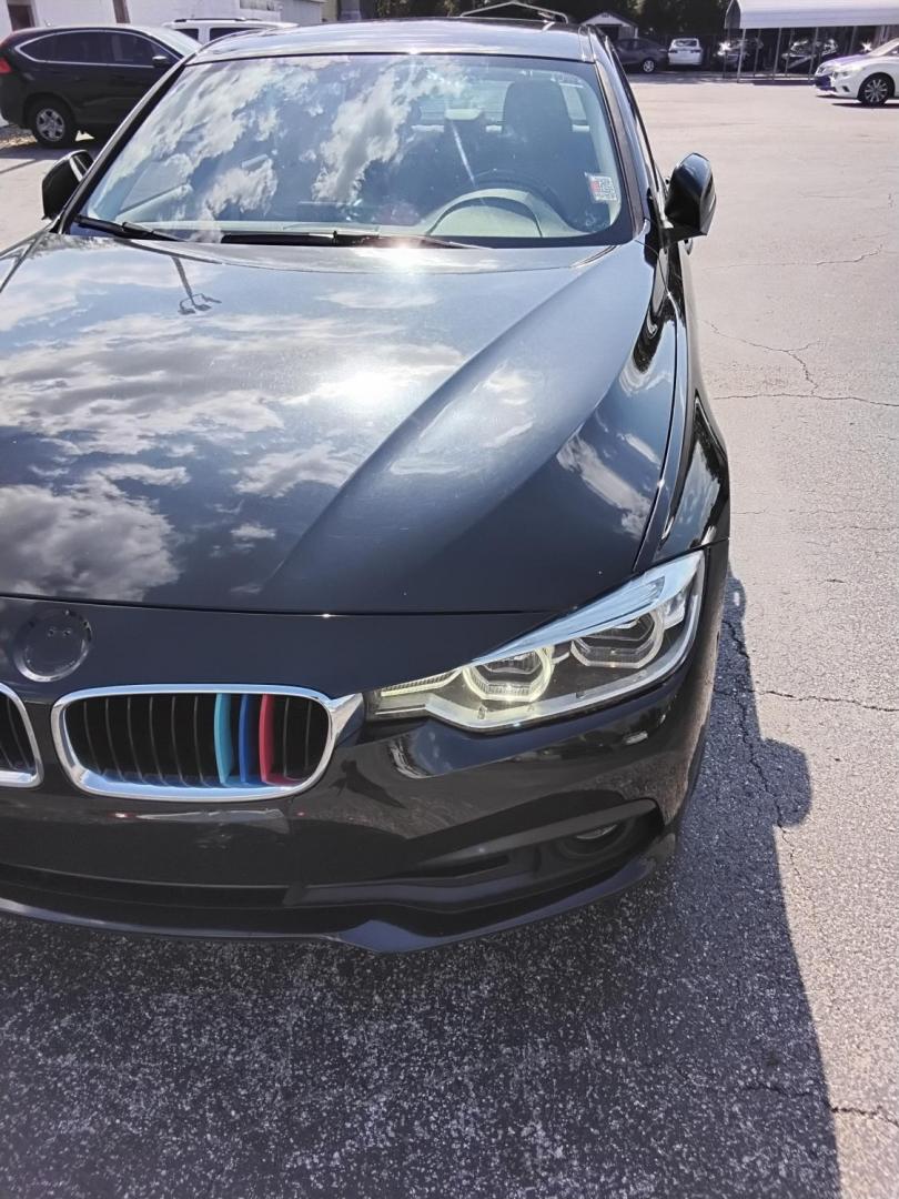 2018 BLACK /Beige BMW 3-Series 320i Sedan (WBA8A9C58JA) with an 2.0L L4 DOHC 16V engine, 8A transmission, located at 6112 N Florida Avenue, Tampa, FL, 33604, (888) 521-5131, 27.954929, -82.459534 - $499 DOWN PLUS TAX & TAG. - Photo#7