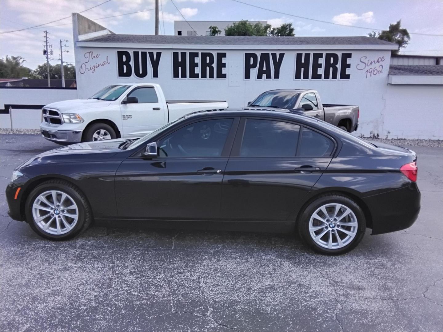 2018 BLACK /Beige BMW 3-Series 320i Sedan (WBA8A9C58JA) with an 2.0L L4 DOHC 16V engine, 8A transmission, located at 6112 N Florida Avenue, Tampa, FL, 33604, (888) 521-5131, 27.954929, -82.459534 - $499 DOWN PLUS TAX & TAG. - Photo#0