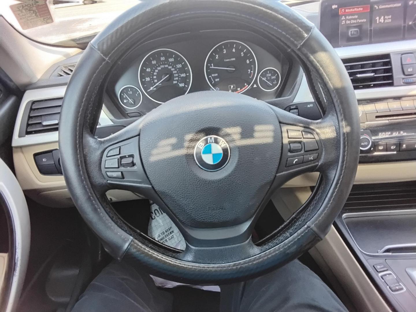 2018 BLACK /Beige BMW 3-Series 320i Sedan (WBA8A9C58JA) with an 2.0L L4 DOHC 16V engine, 8A transmission, located at 6112 N Florida Avenue, Tampa, FL, 33604, (888) 521-5131, 27.954929, -82.459534 - $499 DOWN PLUS TAX & TAG. - Photo#20