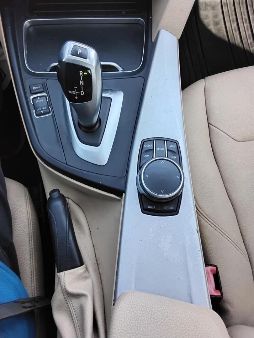 2018 BLACK /Beige BMW 3-Series 320i Sedan (WBA8A9C58JA) with an 2.0L L4 DOHC 16V engine, 8A transmission, located at 6112 N Florida Avenue, Tampa, FL, 33604, (888) 521-5131, 27.954929, -82.459534 - $499 DOWN PLUS TAX & TAG.- Photo#19