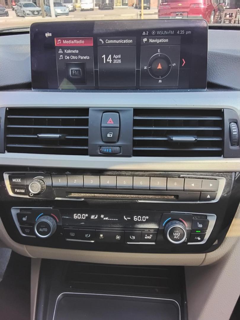 2018 BLACK /Beige BMW 3-Series 320i Sedan (WBA8A9C58JA) with an 2.0L L4 DOHC 16V engine, 8A transmission, located at 6112 N Florida Avenue, Tampa, FL, 33604, (888) 521-5131, 27.954929, -82.459534 - $499 DOWN PLUS TAX & TAG. - Photo#15