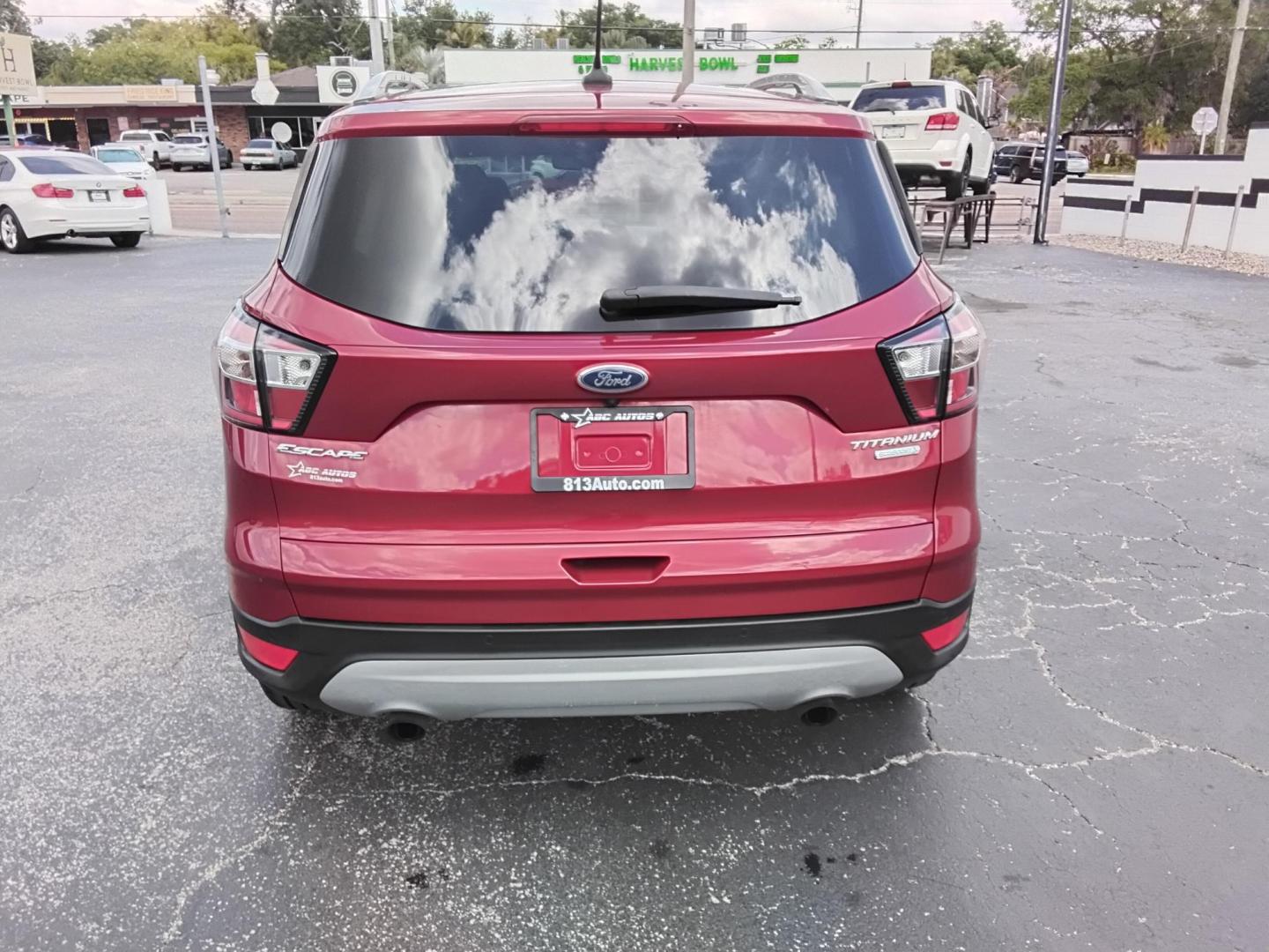2018 RED /Beige Ford Escape Titanium FWD (1FMCU0J93JU) with an 2.0L L4 DOHC 16V engine, 6A transmission, located at 6112 N Florida Avenue, Tampa, FL, 33604, (888) 521-5131, 27.954929, -82.459534 - $499 DOWN PLUS TAX & TAG. - Photo#9