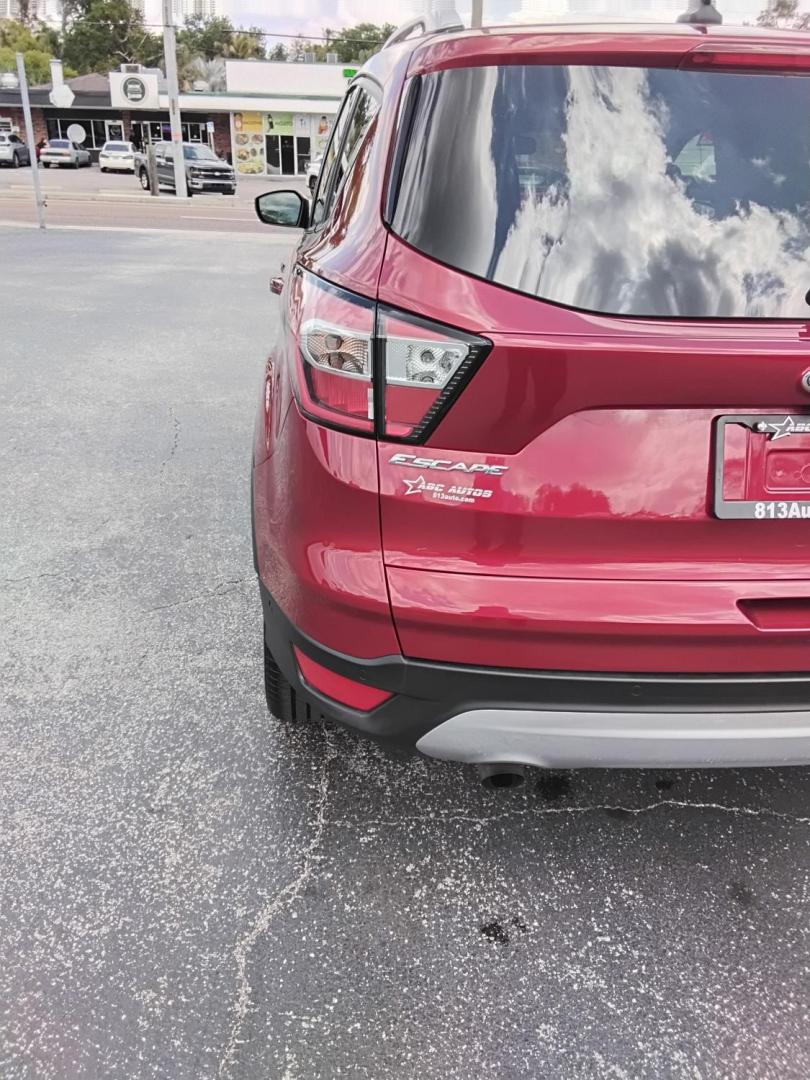 2018 RED /Beige Ford Escape Titanium FWD (1FMCU0J93JU) with an 2.0L L4 DOHC 16V engine, 6A transmission, located at 6112 N Florida Avenue, Tampa, FL, 33604, (888) 521-5131, 27.954929, -82.459534 - $499 DOWN PLUS TAX & TAG. - Photo#11