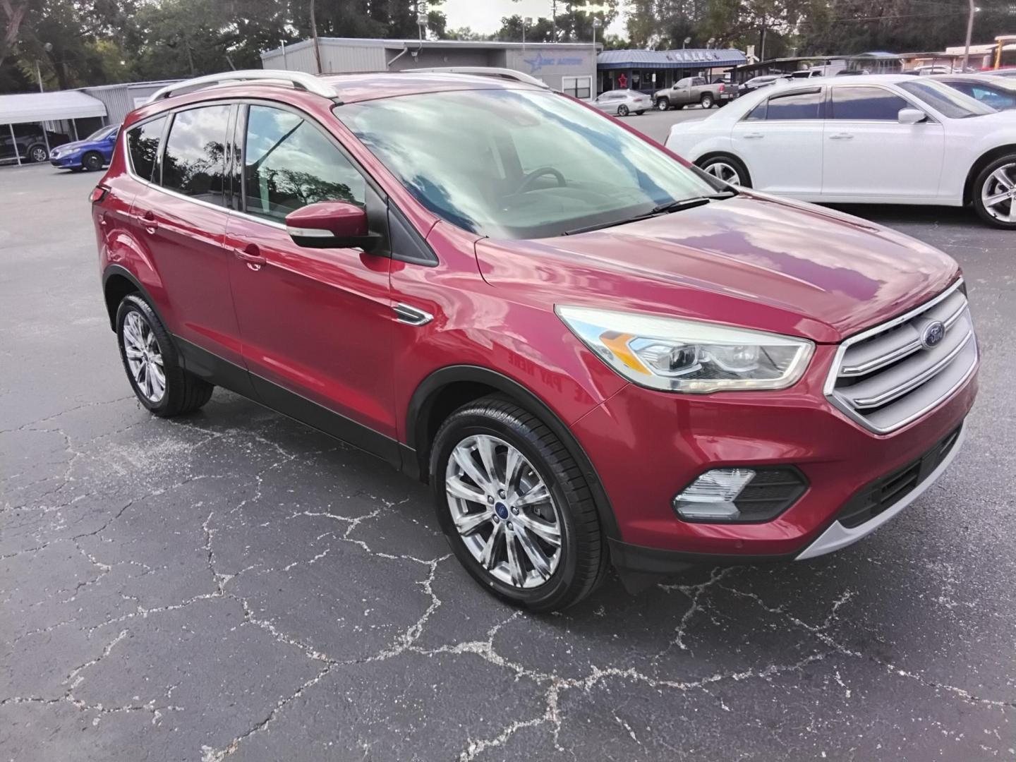 2018 RED /Beige Ford Escape Titanium FWD (1FMCU0J93JU) with an 2.0L L4 DOHC 16V engine, 6A transmission, located at 6112 N Florida Avenue, Tampa, FL, 33604, (888) 521-5131, 27.954929, -82.459534 - $499 DOWN PLUS TAX & TAG. - Photo#6