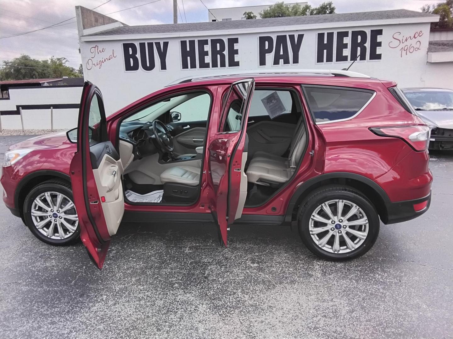 2018 RED /Beige Ford Escape Titanium FWD (1FMCU0J93JU) with an 2.0L L4 DOHC 16V engine, 6A transmission, located at 6112 N Florida Avenue, Tampa, FL, 33604, (888) 521-5131, 27.954929, -82.459534 - $499 DOWN PLUS TAX & TAG. - Photo#1