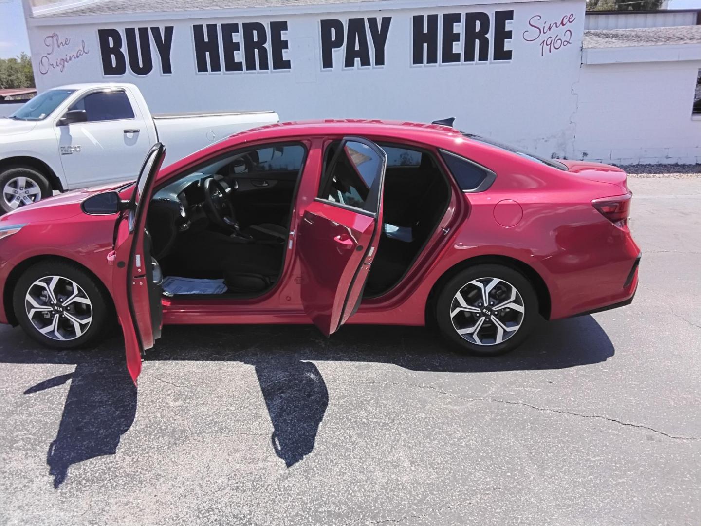 2021 RED /Grey Kia Forte FE (3KPF24ADXME) with an 2.0L L4 DOHC 16V engine, CVT transmission, located at 6112 N Florida Avenue, Tampa, FL, 33604, (888) 521-5131, 27.954929, -82.459534 - $499 down plus tax & tag. - Photo#1