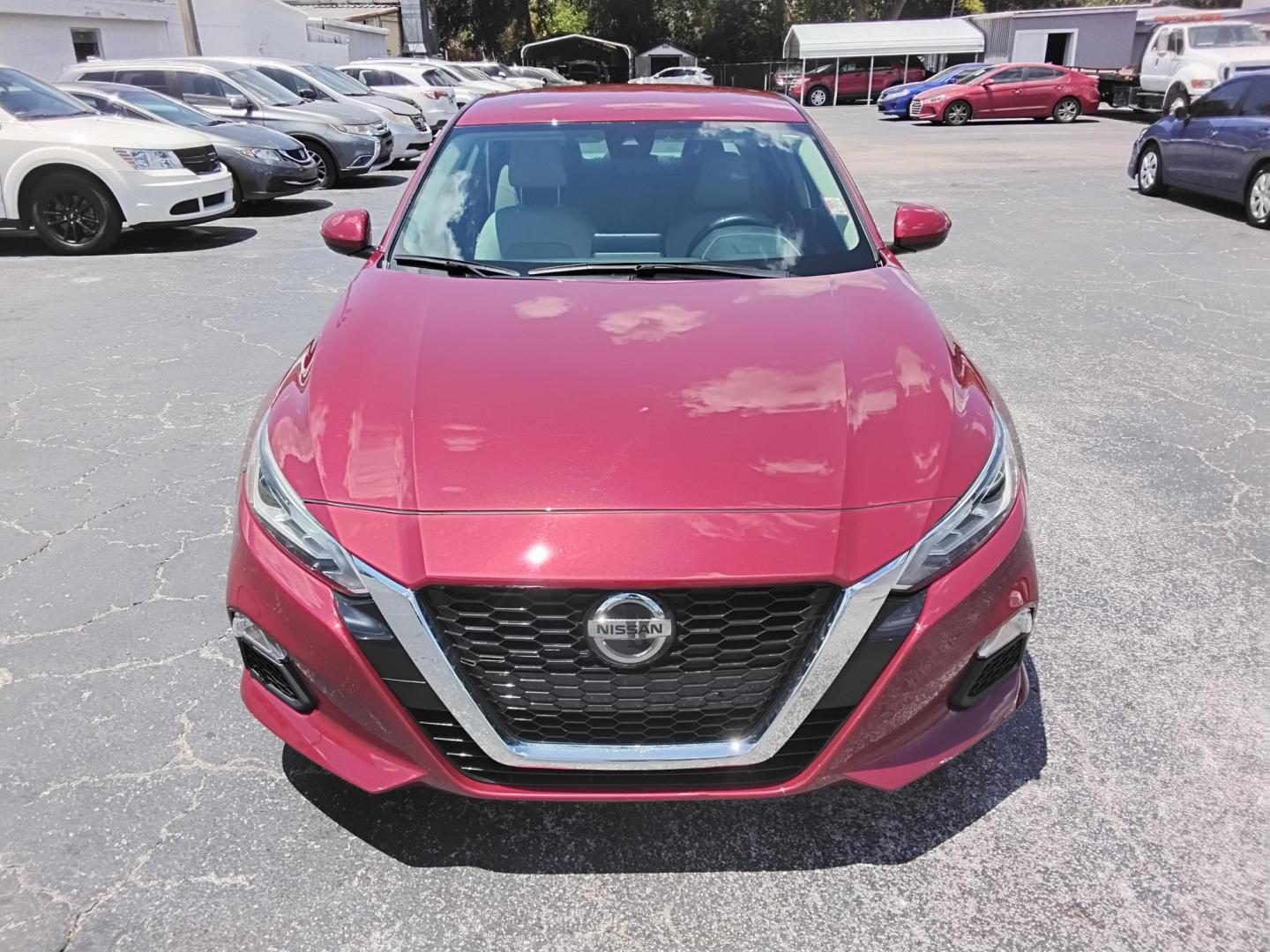 2022 RED Nissan Altima 2.5 SV (1N4BL4DV1NN) with an 2.5L L4 DOHC 16V engine, CVT transmission, located at 6112 N Florida Avenue, Tampa, FL, 33604, (888) 521-5131, 27.954929, -82.459534 - $499 down plus tax & tag. - Photo#2