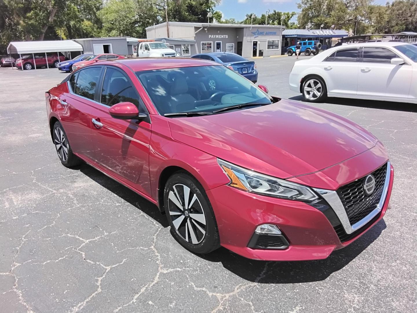 2022 RED Nissan Altima 2.5 SV (1N4BL4DV1NN) with an 2.5L L4 DOHC 16V engine, CVT transmission, located at 6112 N Florida Avenue, Tampa, FL, 33604, (888) 521-5131, 27.954929, -82.459534 - $499 down plus tax & tag. - Photo#3