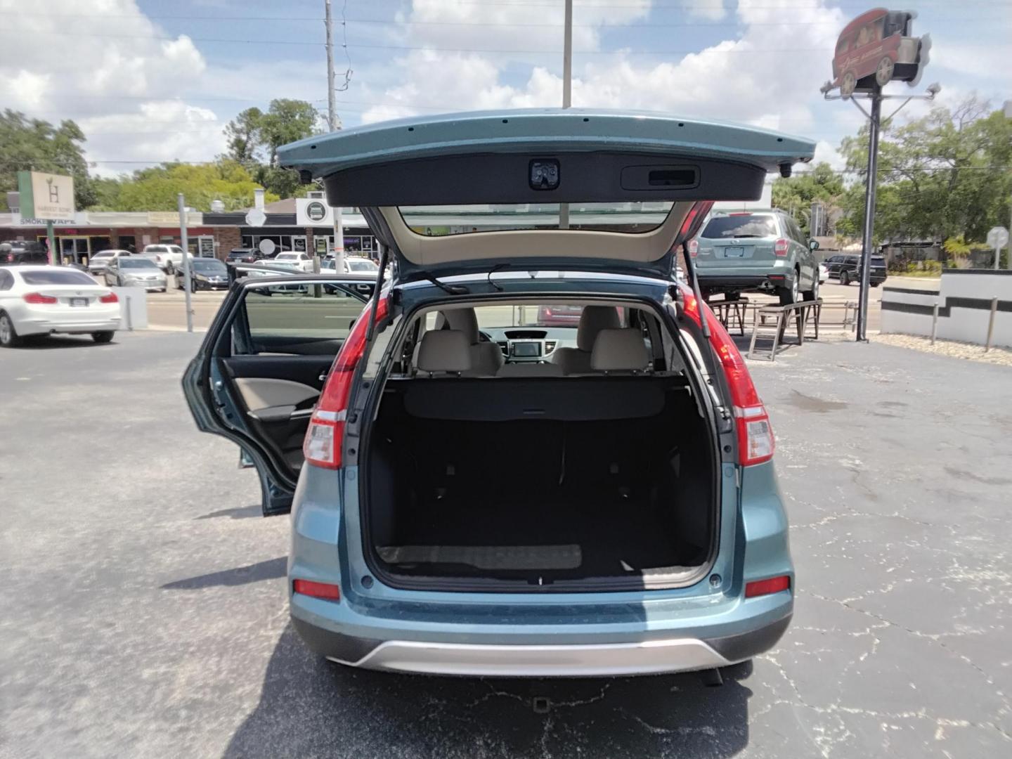 2015 TEAL /Beige Honda CR-V EX 2WD (2HKRM3H52FH) with an 2.4L L4 DOHC 16V engine, Continuously Variable Transmission transmission, located at 6112 N Florida Avenue, Tampa, FL, 33604, (888) 521-5131, 27.954929, -82.459534 - $499 down plus tax & tag. - Photo#4