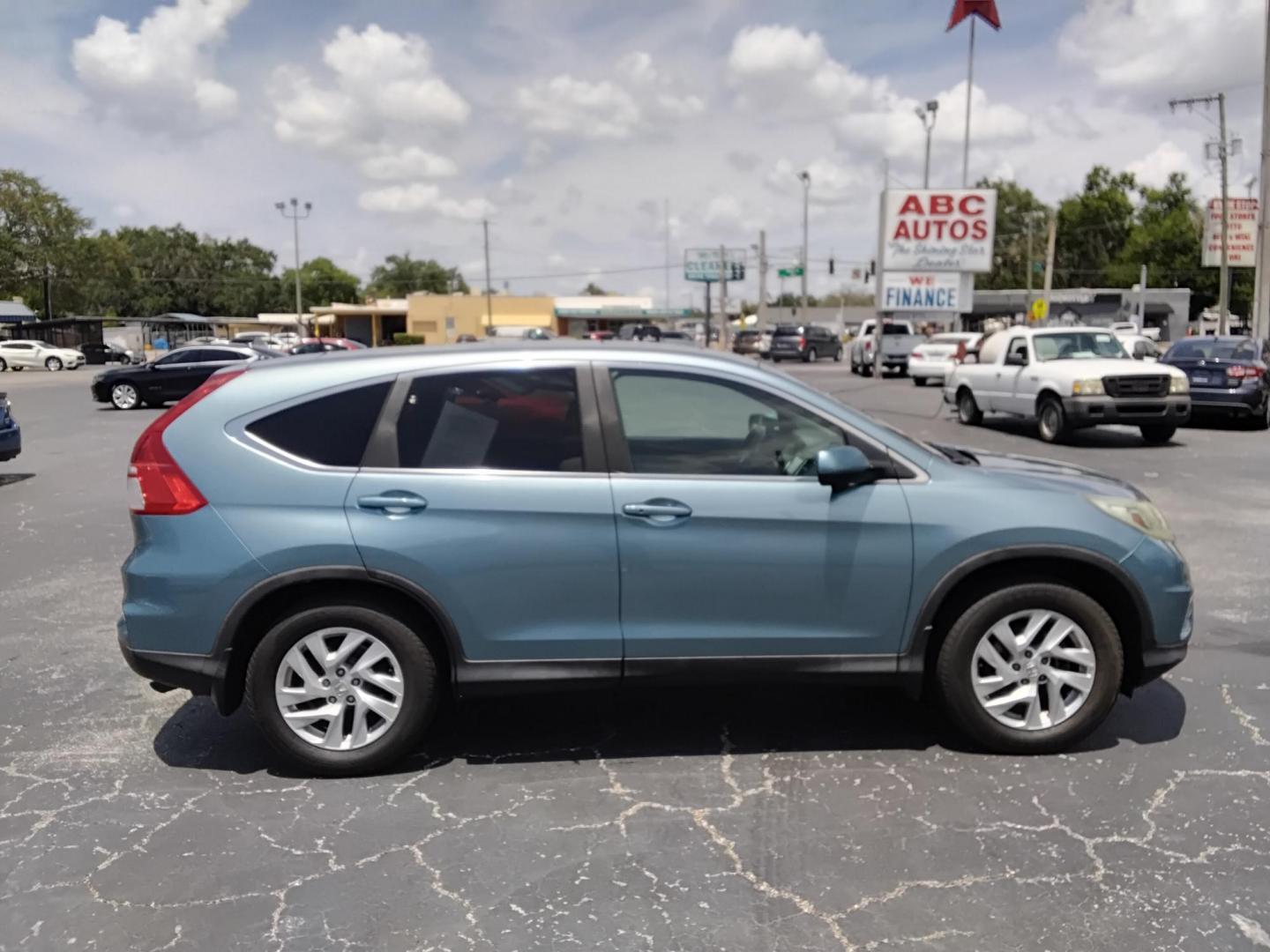 2015 TEAL /Beige Honda CR-V EX 2WD (2HKRM3H52FH) with an 2.4L L4 DOHC 16V engine, Continuously Variable Transmission transmission, located at 6112 N Florida Avenue, Tampa, FL, 33604, (888) 521-5131, 27.954929, -82.459534 - $499 down plus tax & tag. - Photo#2