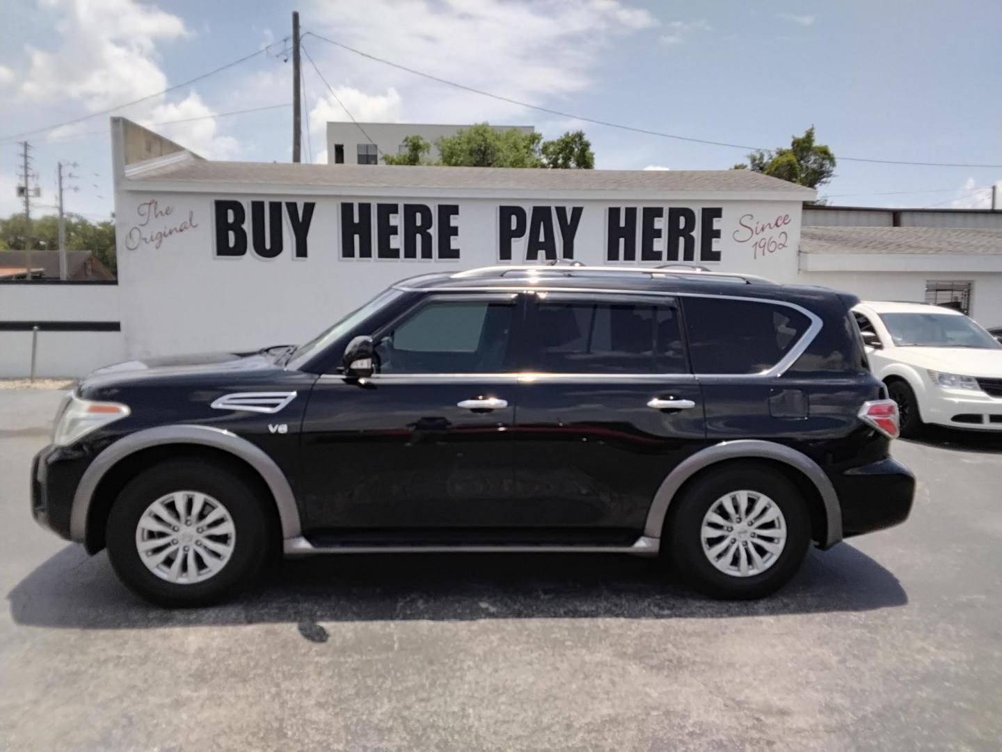 2017 BLACK /BLACK Nissan Armada SL 2WD (JN8AY2ND6H9) with an 5.6L V8 DOHC 32V engine, 7A transmission, located at 6112 N Florida Avenue, Tampa, FL, 33604, (888) 521-5131, 27.954929, -82.459534 - $499 down plus tax & tag. - Photo#0