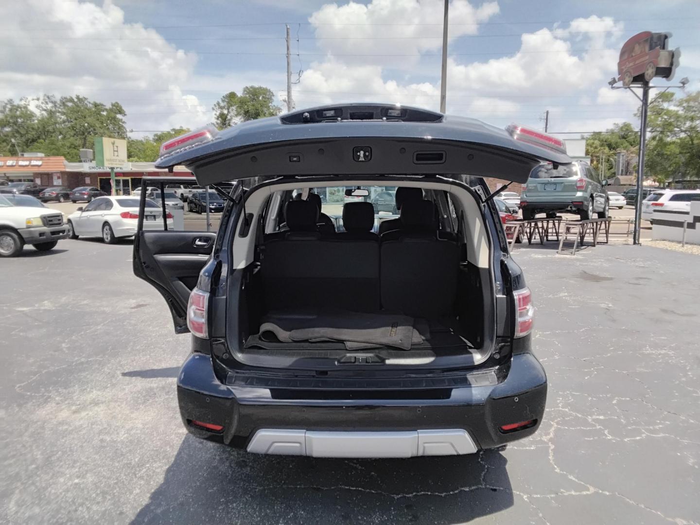 2017 BLACK /BLACK Nissan Armada SL 2WD (JN8AY2ND6H9) with an 5.6L V8 DOHC 32V engine, 7A transmission, located at 6112 N Florida Avenue, Tampa, FL, 33604, (888) 521-5131, 27.954929, -82.459534 - $499 down plus tax & tag. - Photo#4