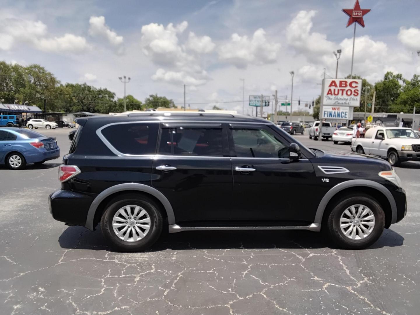 2017 BLACK /BLACK Nissan Armada SL 2WD (JN8AY2ND6H9) with an 5.6L V8 DOHC 32V engine, 7A transmission, located at 6112 N Florida Avenue, Tampa, FL, 33604, (888) 521-5131, 27.954929, -82.459534 - $499 down plus tax & tag. - Photo#2