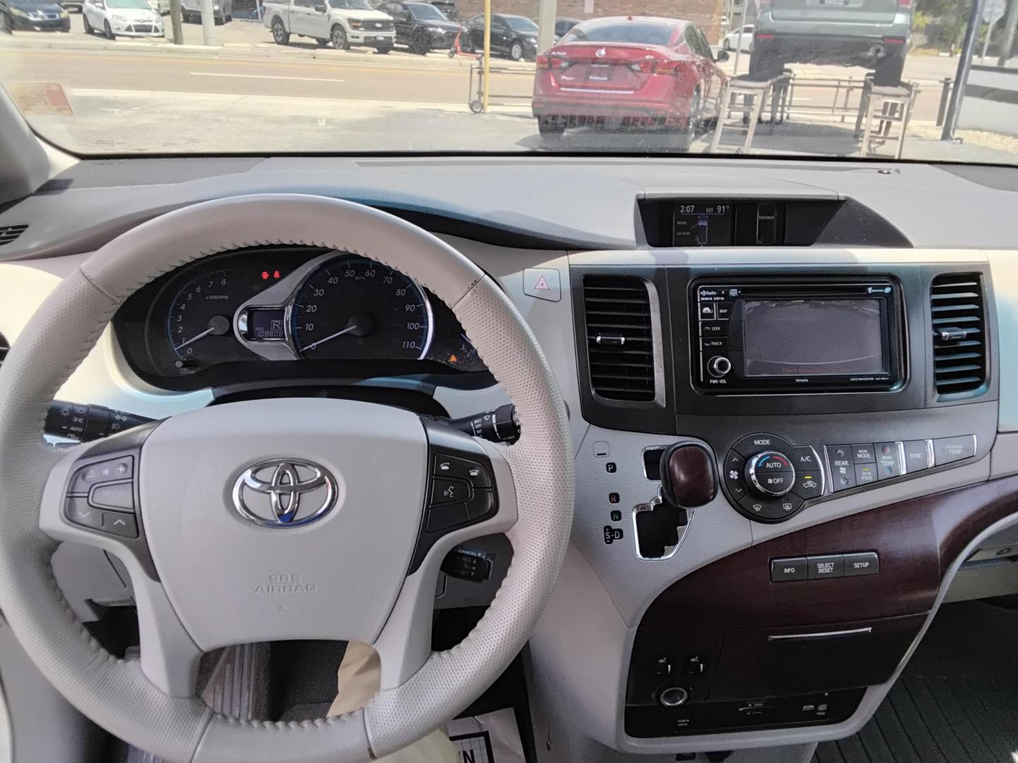 2014 SILVER /Beige Toyota Sienna XLE FWD 8-Passenger V6 (5TDYK3DC8ES) with an 3.5L V6 EFI DOHC 24V engine, 5-Speed Automatic transmission, located at 6112 N Florida Avenue, Tampa, FL, 33604, (888) 521-5131, 27.954929, -82.459534 - $499 DOWN PLUS TAX & TAG. - Photo#5
