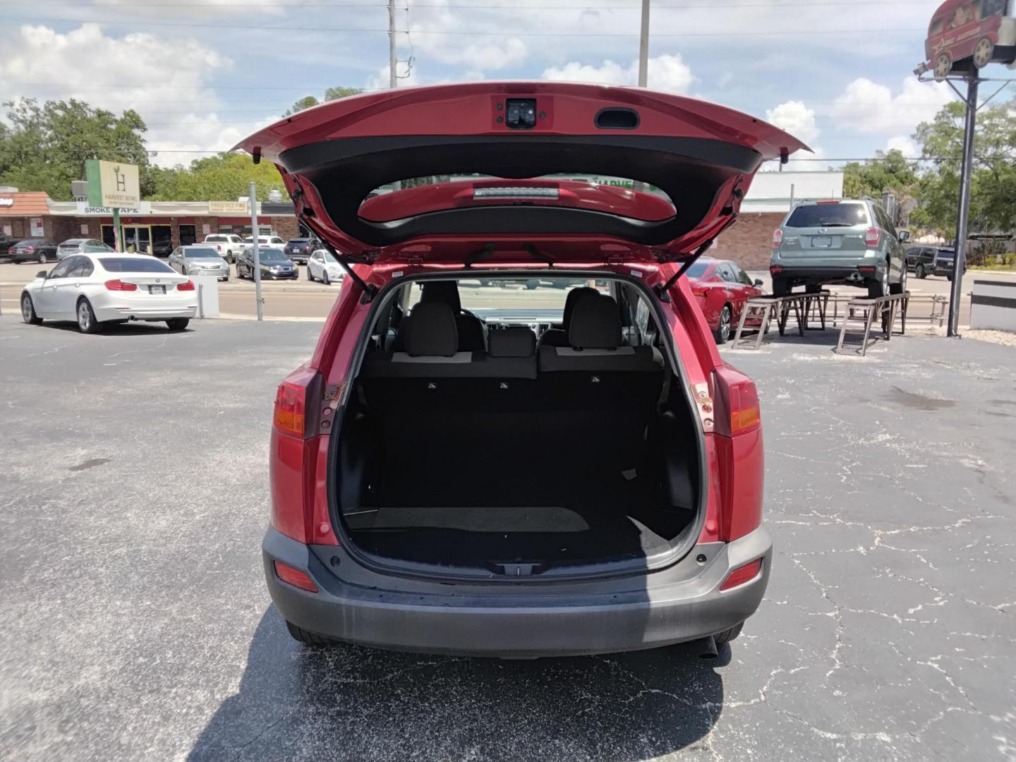 2014 RED /BLACK Toyota RAV4 XLE FWD (2T3WFREV6EW) with an 2.5L L4 DOHC 16V engine, 6-Speed Automatic transmission, located at 6112 N Florida Avenue, Tampa, FL, 33604, (888) 521-5131, 27.954929, -82.459534 - $499 DOWN PLUS TAX & TAG. - Photo#4