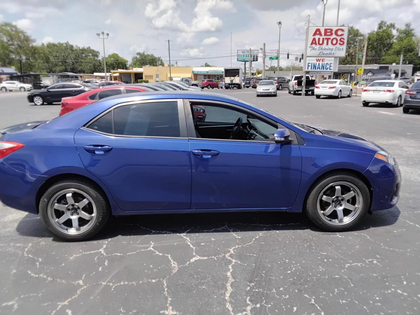 2015 BLUE /Black Toyota Corolla L 4-Speed AT (2T1BURHE0FC) with an 1.8L L4 DOHC 16V engine, 4-Speed Automatic transmission, located at 6112 N Florida Avenue, Tampa, FL, 33604, (888) 521-5131, 27.954929, -82.459534 - $499 DOWN PLUS TAX & TAG. - Photo#2