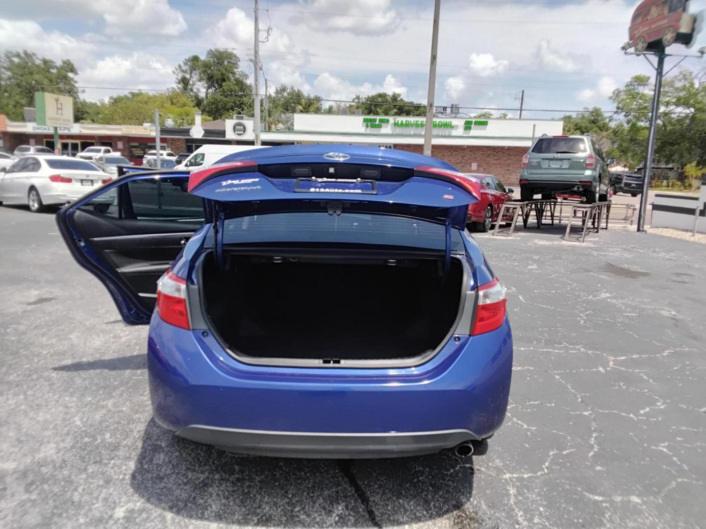 2015 BLUE /Black Toyota Corolla L 4-Speed AT (2T1BURHE0FC) with an 1.8L L4 DOHC 16V engine, 4-Speed Automatic transmission, located at 6112 N Florida Avenue, Tampa, FL, 33604, (888) 521-5131, 27.954929, -82.459534 - $499 DOWN PLUS TAX & TAG. - Photo#3