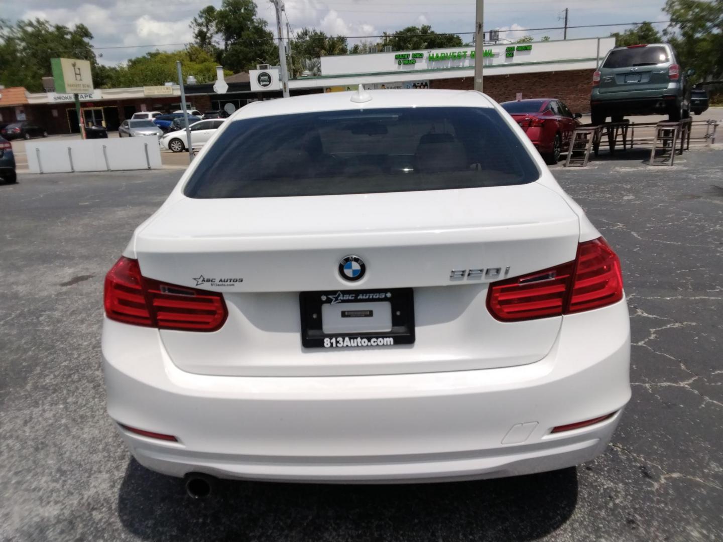 2014 White /Beige BMW 3-Series 320i Sedan (WBA3B1C53EK) with an 2.0L L4 DOHC 16V engine, located at 6112 N Florida Avenue, Tampa, FL, 33604, (888) 521-5131, 27.954929, -82.459534 - $499 down plus tax & tag.- Photo#3