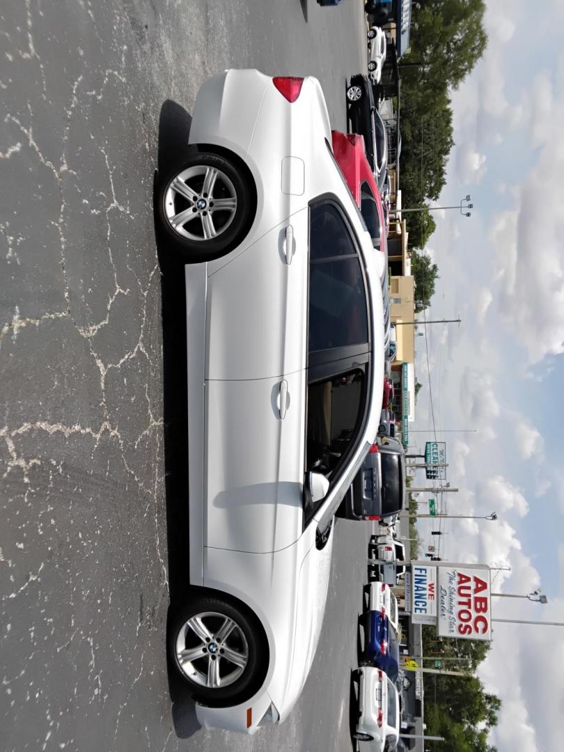 2014 White /Beige BMW 3-Series 320i Sedan (WBA3B1C53EK) with an 2.0L L4 DOHC 16V engine, located at 6112 N Florida Avenue, Tampa, FL, 33604, (888) 521-5131, 27.954929, -82.459534 - $499 down plus tax & tag. - Photo#2