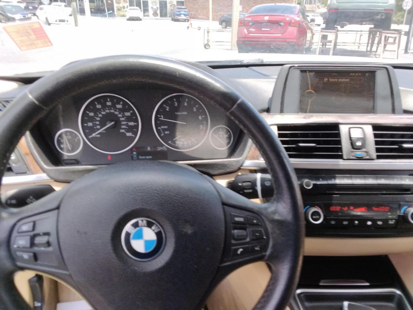 2014 White /Beige BMW 3-Series 320i Sedan (WBA3B1C53EK) with an 2.0L L4 DOHC 16V engine, located at 6112 N Florida Avenue, Tampa, FL, 33604, (888) 521-5131, 27.954929, -82.459534 - $499 down plus tax & tag.- Photo#5
