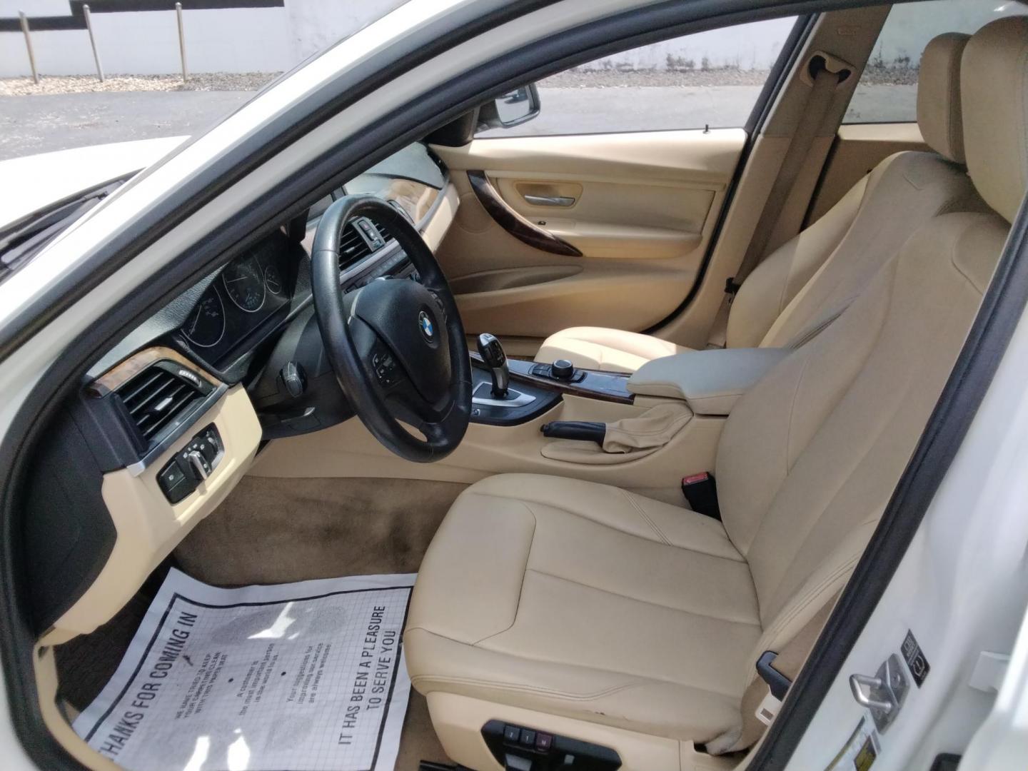 2014 White /Beige BMW 3-Series 320i Sedan (WBA3B1C53EK) with an 2.0L L4 DOHC 16V engine, located at 6112 N Florida Avenue, Tampa, FL, 33604, (888) 521-5131, 27.954929, -82.459534 - $499 down plus tax & tag.- Photo#6