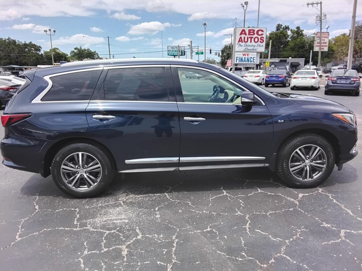 2017 BLUE /Beige Infiniti QX60 Base AWD (5N1DL0MMXHC) with an 3.5L V6 DOHC 24V engine, CVT transmission, located at 6112 N Florida Avenue, Tampa, FL, 33604, (888) 521-5131, 27.954929, -82.459534 - $499 down plus tax & tag. - Photo#5