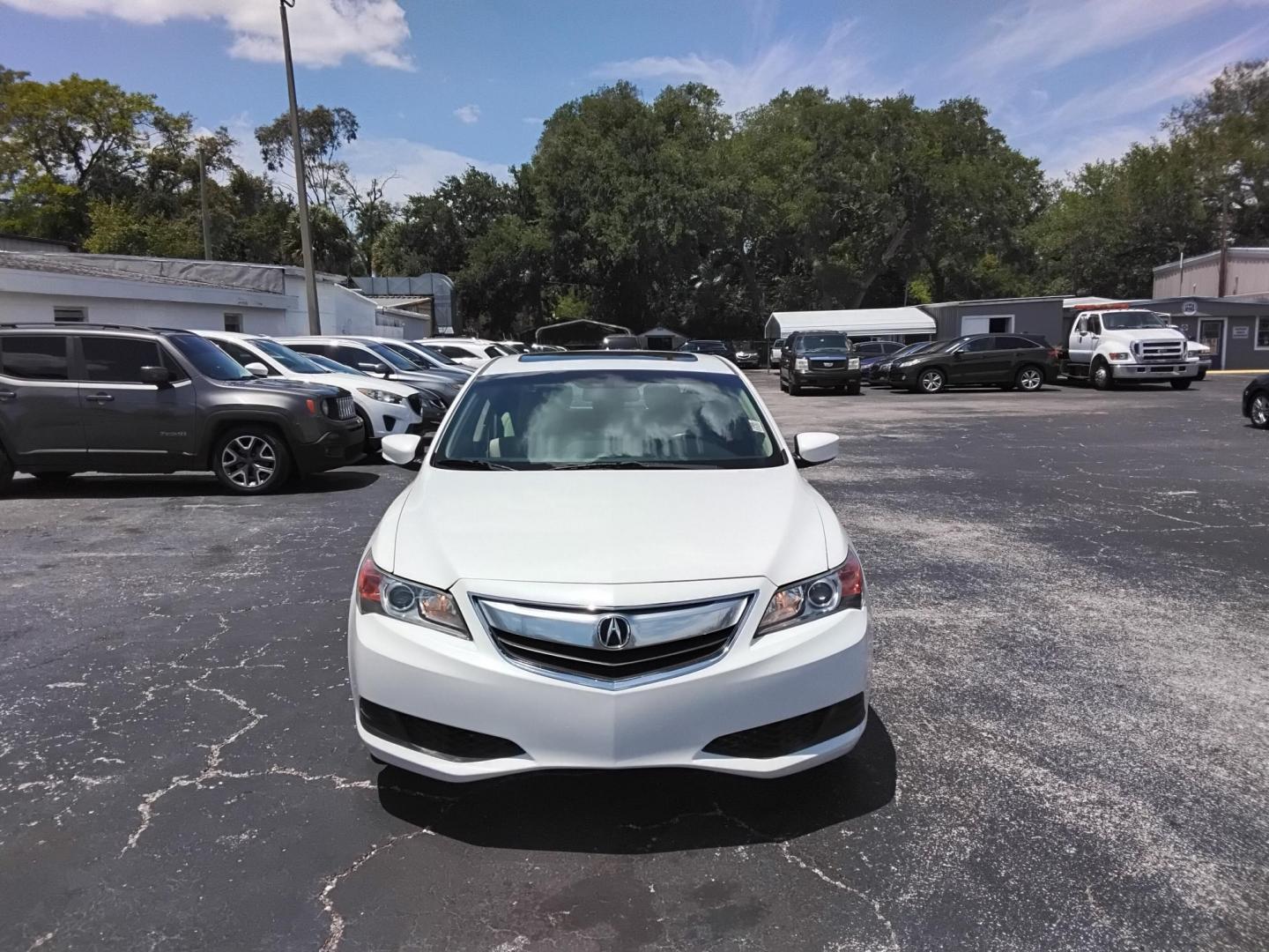 2015 White /Beige Acura ILX 5-Spd AT w/ Technology Package (19VDE1F77FE) with an 2.0L L4 16V DOHC engine, 5-Speed Automatic transmission, located at 6112 N Florida Avenue, Tampa, FL, 33604, (888) 521-5131, 27.954929, -82.459534 - $499 down plus tax & tag. - Photo#1