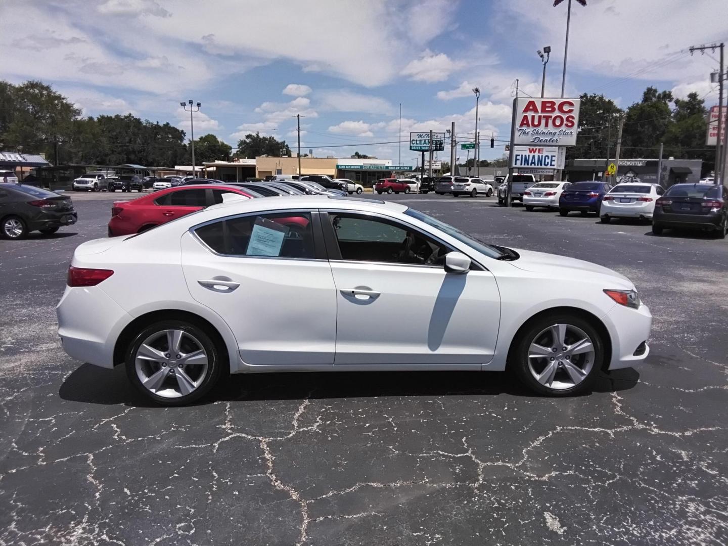 2015 White /Beige Acura ILX 5-Spd AT w/ Technology Package (19VDE1F77FE) with an 2.0L L4 16V DOHC engine, 5-Speed Automatic transmission, located at 6112 N Florida Avenue, Tampa, FL, 33604, (888) 521-5131, 27.954929, -82.459534 - $499 down plus tax & tag. - Photo#2