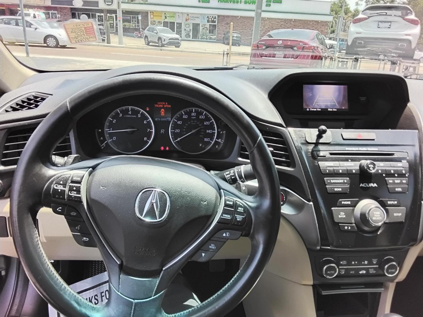 2014 GRAY /Beige Acura ILX 5-Spd AT w/ Premium Package (19VDE1F56EE) with an 2.0L L4 16V DOHC engine, 5-Speed Automatic transmission, located at 6112 N Florida Avenue, Tampa, FL, 33604, (888) 521-5131, 27.954929, -82.459534 - $499 DOWN PLUS TAX & TAG.- Photo#5