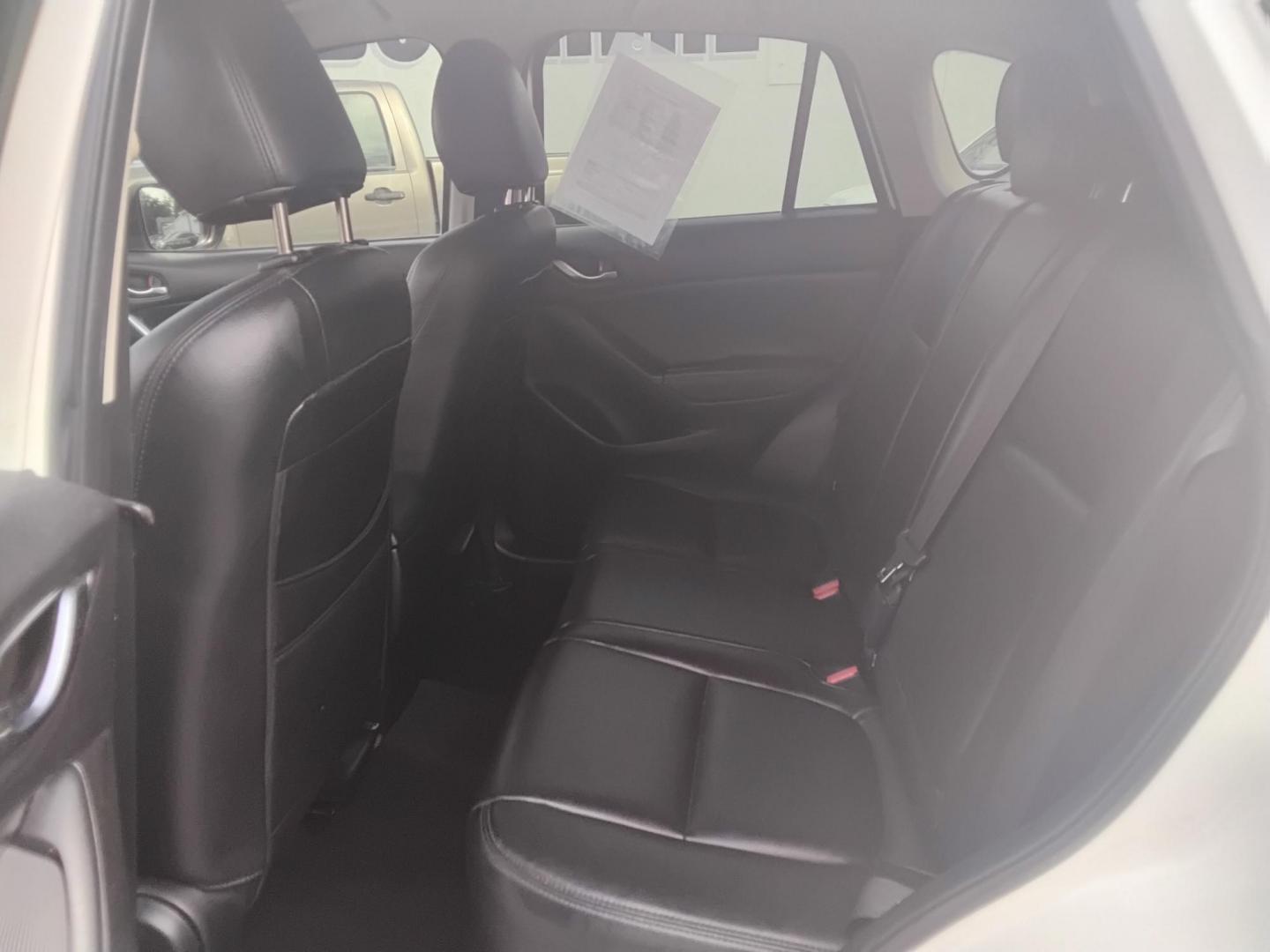 2014 White /Black Mazda CX-5 Sport AT (JM3KE2BE0E0) with an 2.5L L4 DOHC 16V engine, 6-Speed Automatic transmission, located at 6112 N Florida Avenue, Tampa, FL, 33604, (888) 521-5131, 27.954929, -82.459534 - $499 down plus tax & tag. - Photo#6