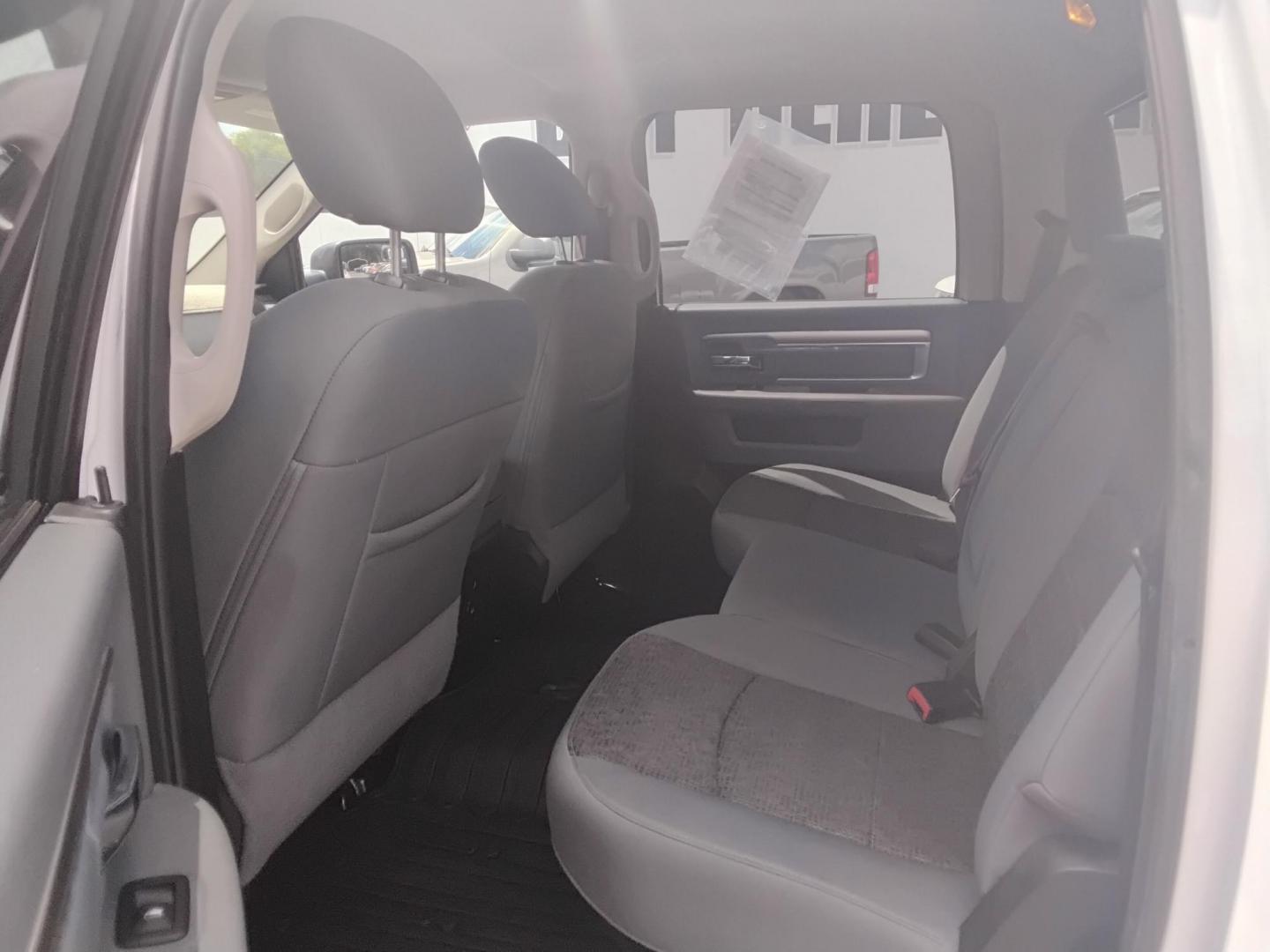 2015 White /Grey RAM 1500 SLT Crew Cab SWB 2WD (1C6RR6LTXFS) with an 5.7L V8 OHV 16V engine, 6-Speed Automatic transmission, located at 6112 N Florida Avenue, Tampa, FL, 33604, (888) 521-5131, 27.954929, -82.459534 - $499 DOWN PLUS TAX & TAG. - Photo#7