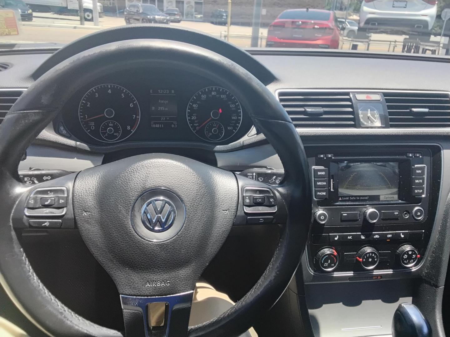 2014 White /BLACK Volkswagen Passat 1.8T SE AT (1VWBS7A38EC) with an 1.8L L4 TURBO DIESEL engine, 6-Speed Automatic transmission, located at 6112 N Florida Avenue, Tampa, FL, 33604, (888) 521-5131, 27.954929, -82.459534 - $499 DOWN PLUS TAX & TAG. - Photo#5