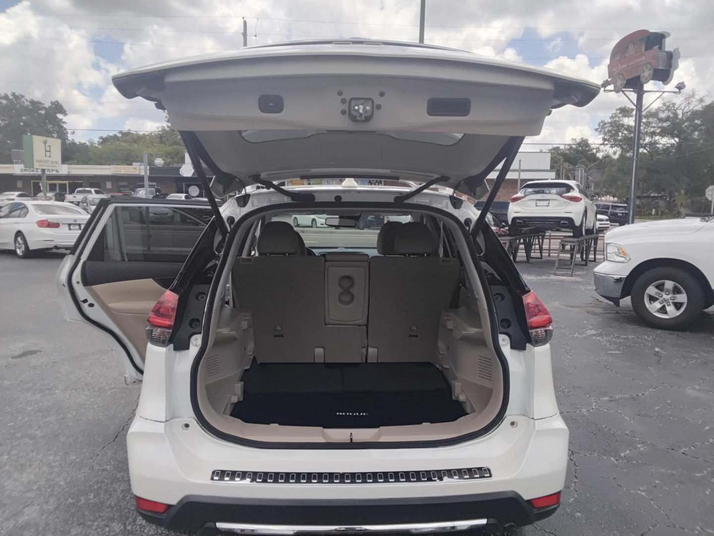 2018 White /Beige Nissan Rogue SV 2WD (JN8AT2MT0JW) with an 2.5L L4 DOHC 16V engine, CVT transmission, located at 6112 N Florida Avenue, Tampa, FL, 33604, (888) 521-5131, 27.954929, -82.459534 - $499 down plus tax & tag. - Photo#3