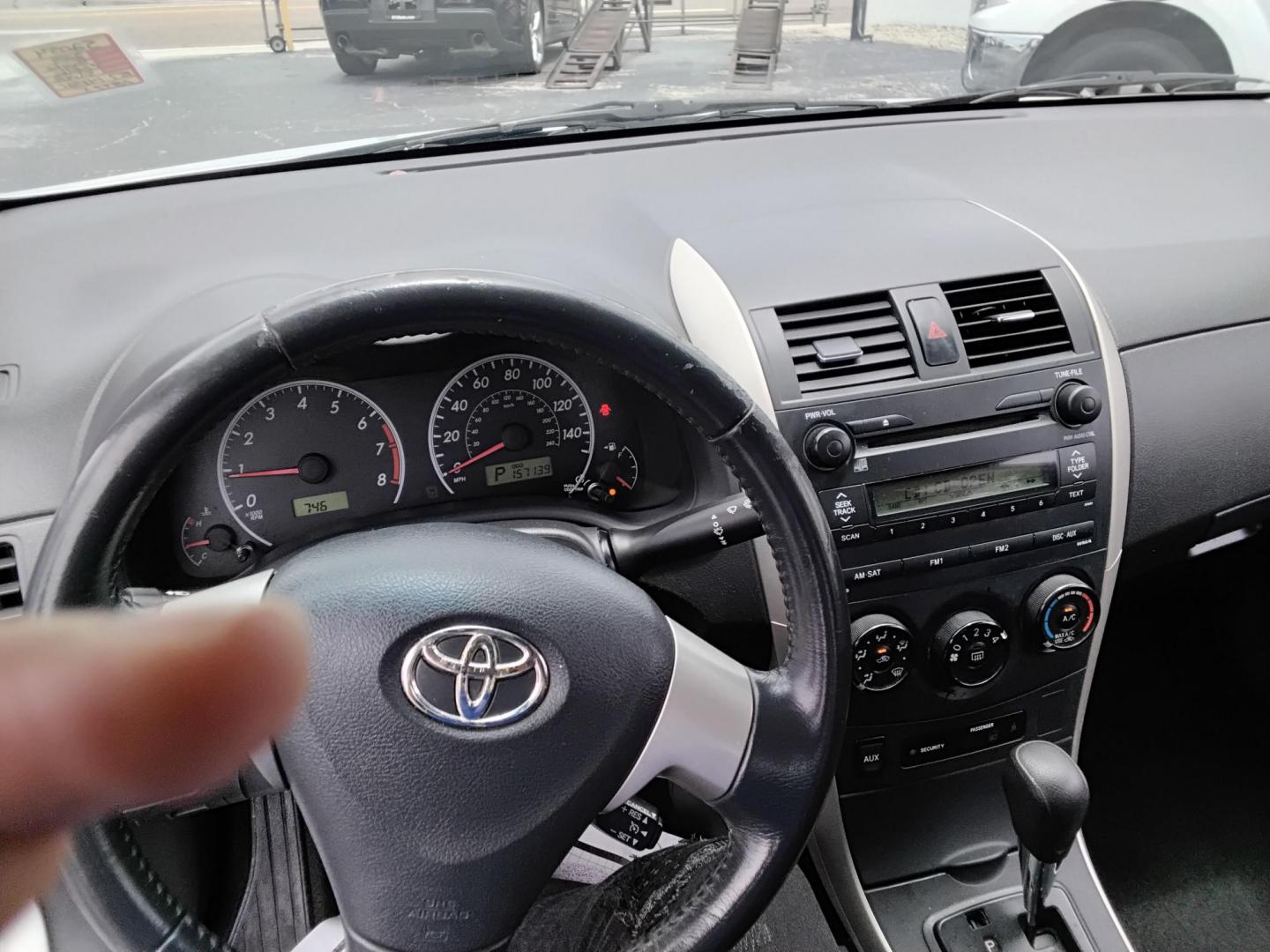 2009 SILVER /Grey Toyota Corolla Base 4-Speed AT (1NXBU40E59Z) with an 1.8L L4 DOHC 16V engine, 4-Speed Automatic Overdrive transmission, located at 6112 N Florida Avenue, Tampa, FL, 33604, (888) 521-5131, 27.954929, -82.459534 - $499 down plus tax & tag. - Photo#5
