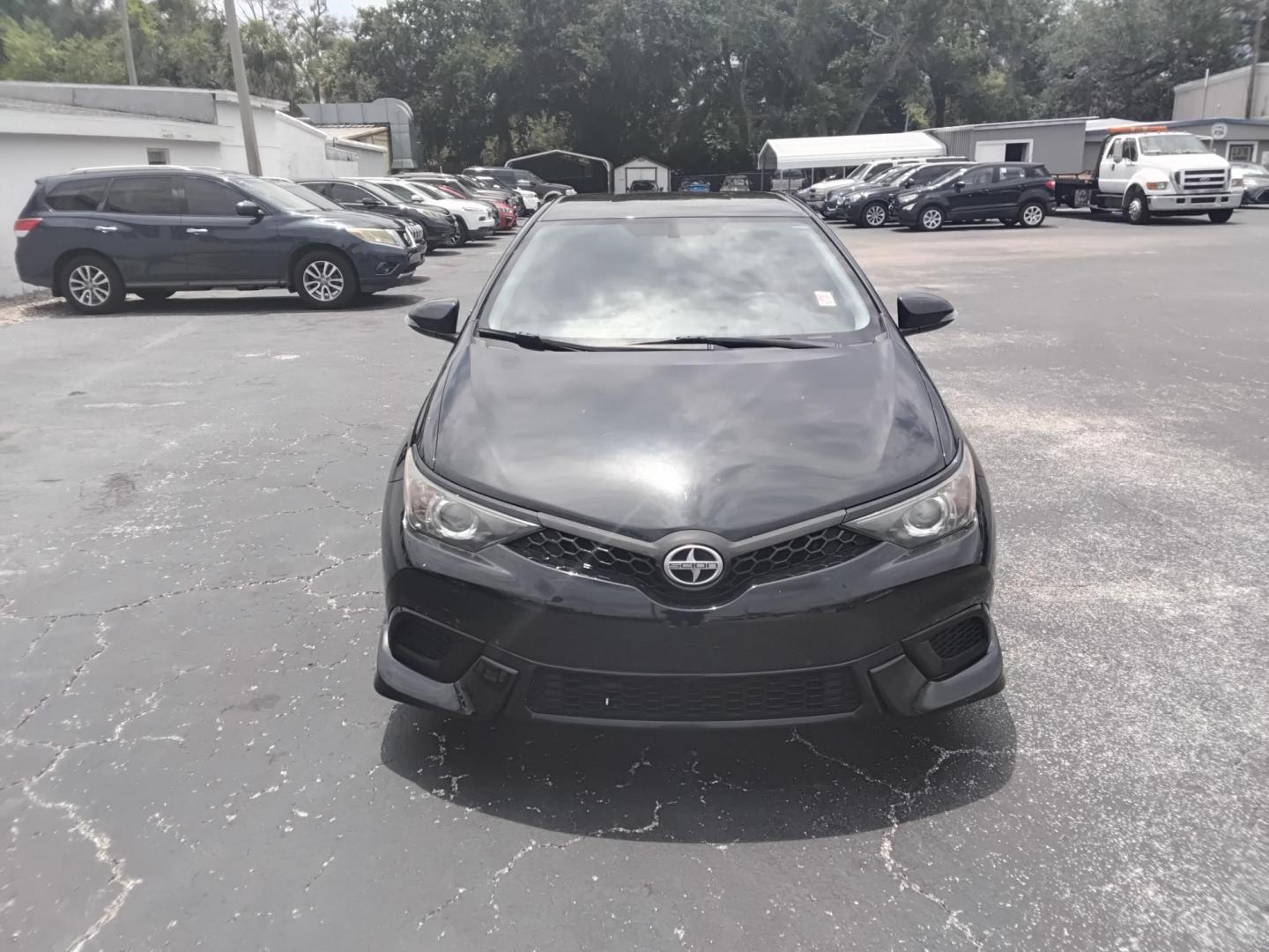 2016 BLACK /Grey Scion iM 6M (JTNKARJE9GJ) with an 1.8L L4 DOHC 16V engine, 6M transmission, located at 6112 N Florida Avenue, Tampa, FL, 33604, (888) 521-5131, 27.954929, -82.459534 - $499 down plus tax & tag. - Photo#1