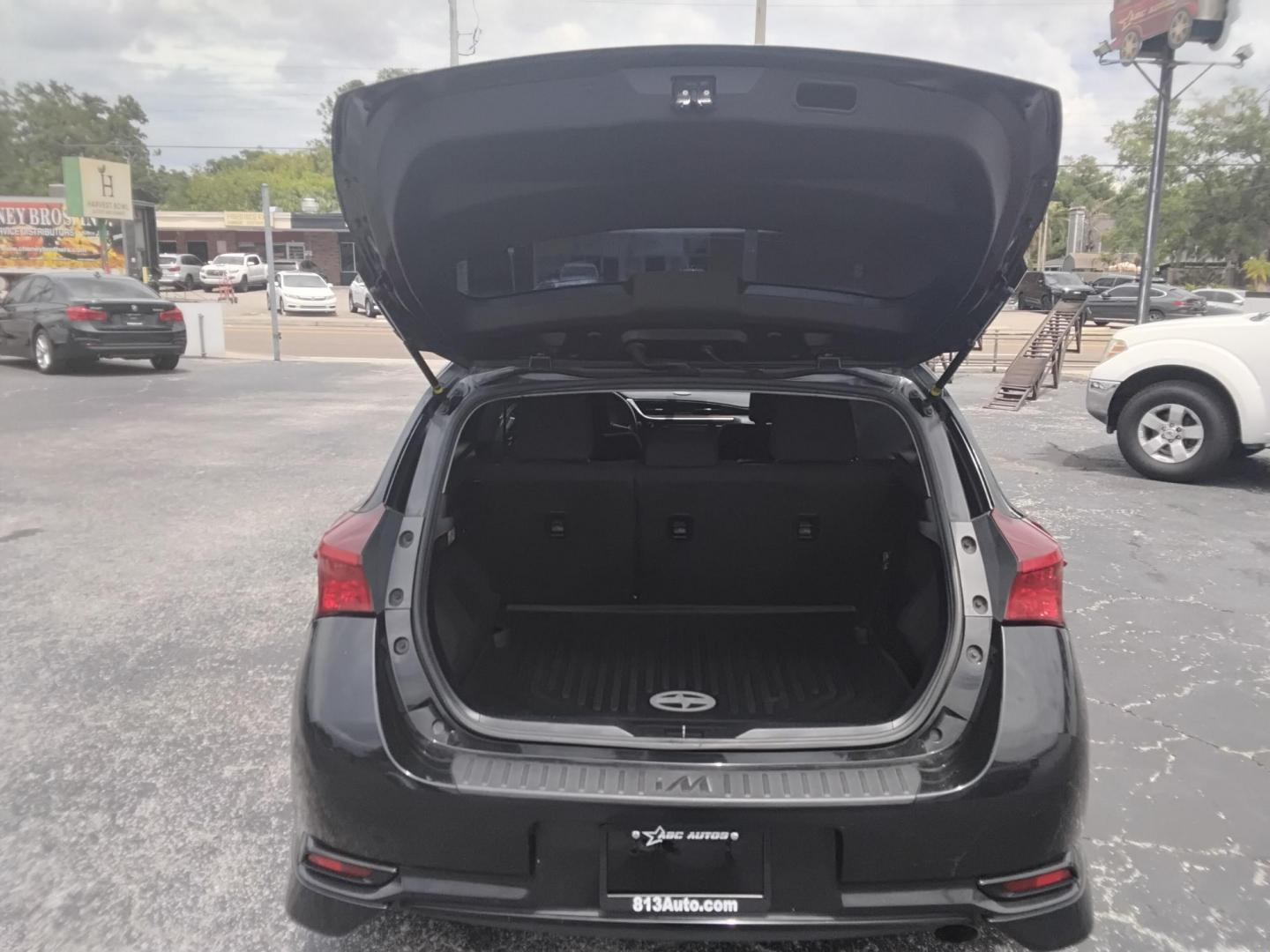 2016 BLACK /Grey Scion iM 6M (JTNKARJE9GJ) with an 1.8L L4 DOHC 16V engine, 6M transmission, located at 6112 N Florida Avenue, Tampa, FL, 33604, (888) 521-5131, 27.954929, -82.459534 - $499 down plus tax & tag. - Photo#4