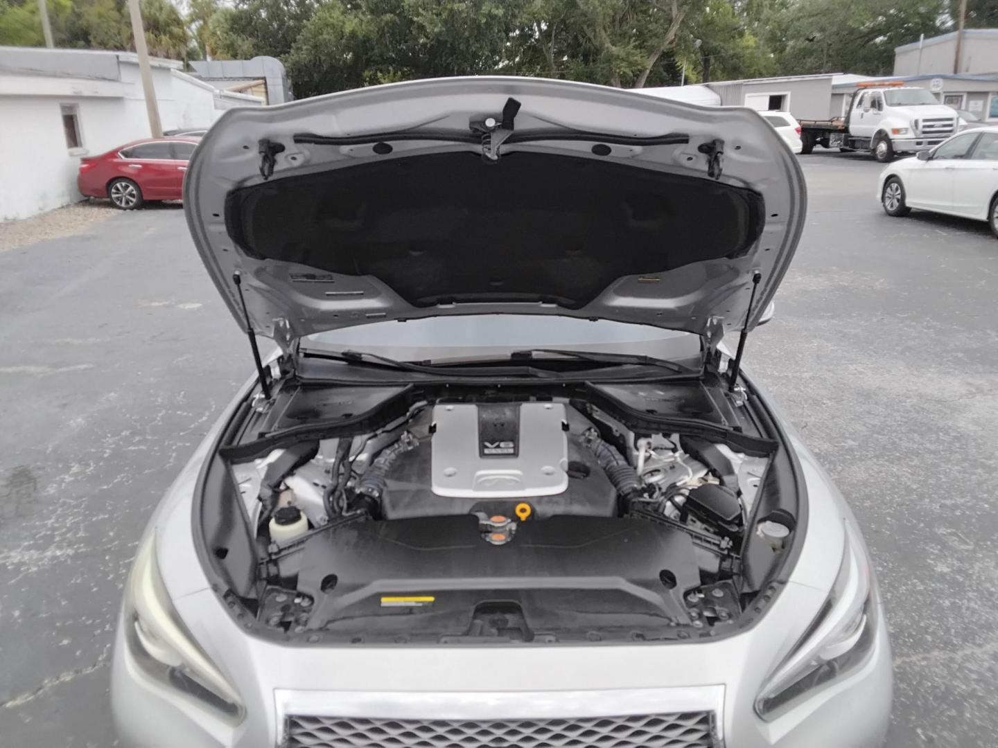 2014 SILVER /BLACK Infiniti Q50 Premium (JN1BV7AP5EM) with an 3.7L V6 DOHC 24V HYBRID engine, 7-Speed Automatic transmission, located at 6112 N Florida Avenue, Tampa, FL, 33604, (888) 521-5131, 27.954929, -82.459534 - $499 down plus tax & tag. - Photo#8