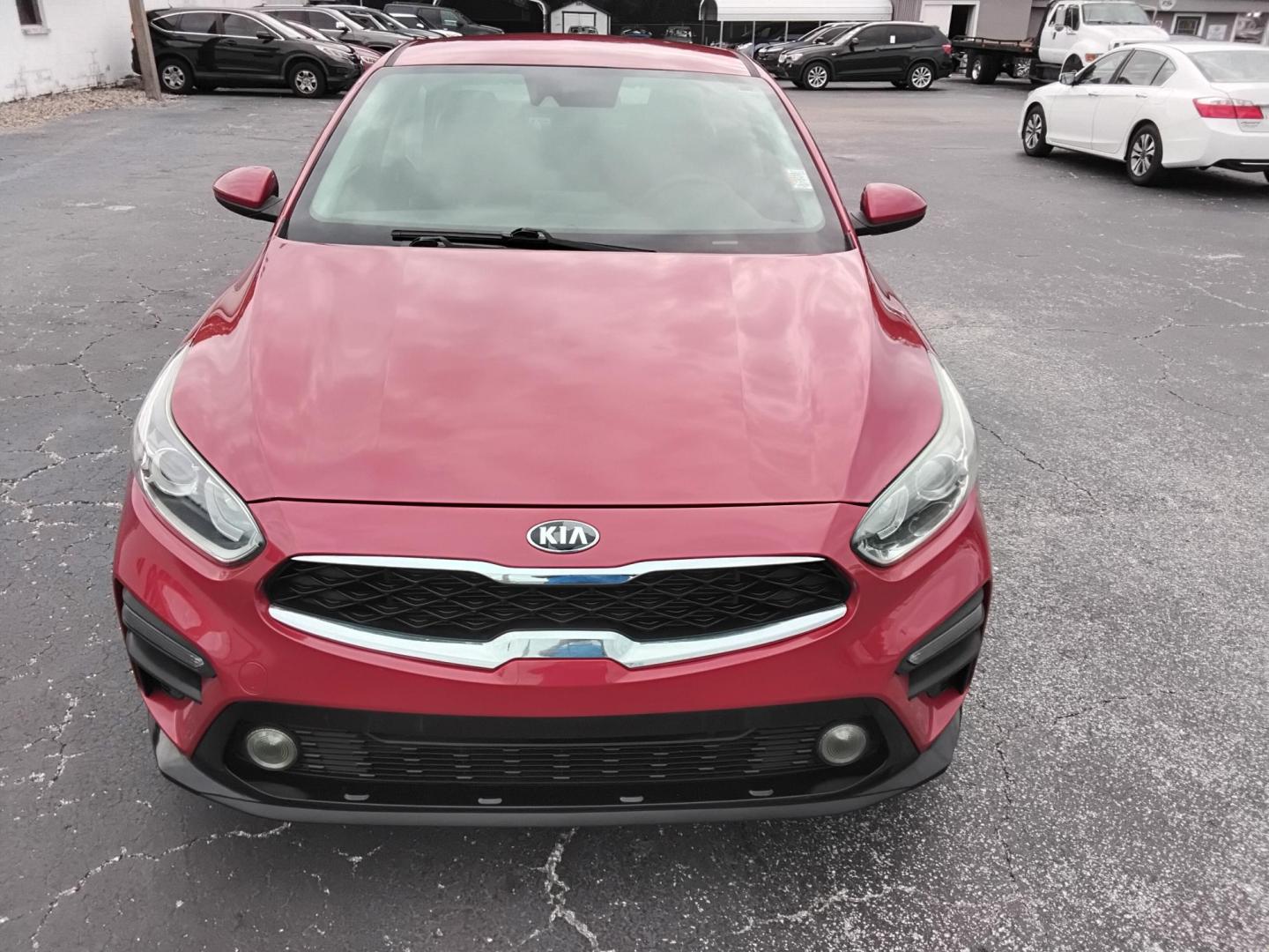 2019 RED /Grey Kia Forte LX 6A (3KPF24AD8KE) with an 2.0L L4 DOHC 16V engine, 6A transmission, located at 6112 N Florida Avenue, Tampa, FL, 33604, (888) 521-5131, 27.954929, -82.459534 - $499 DOWN PLUS TAX & TAG. - Photo#2