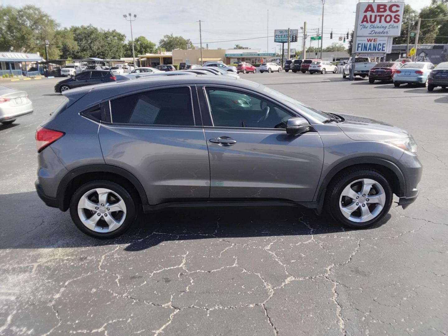 2016 GRAY /BLACK Honda HR-V EX 2WD 6M (3CZRU5G54GM) with an 1.8L L4 DOHC 16V engine, 6M transmission, located at 6112 N Florida Avenue, Tampa, FL, 33604, (888) 521-5131, 27.954929, -82.459534 - $499 DOWN PLUS TAX & TAG. - Photo#4