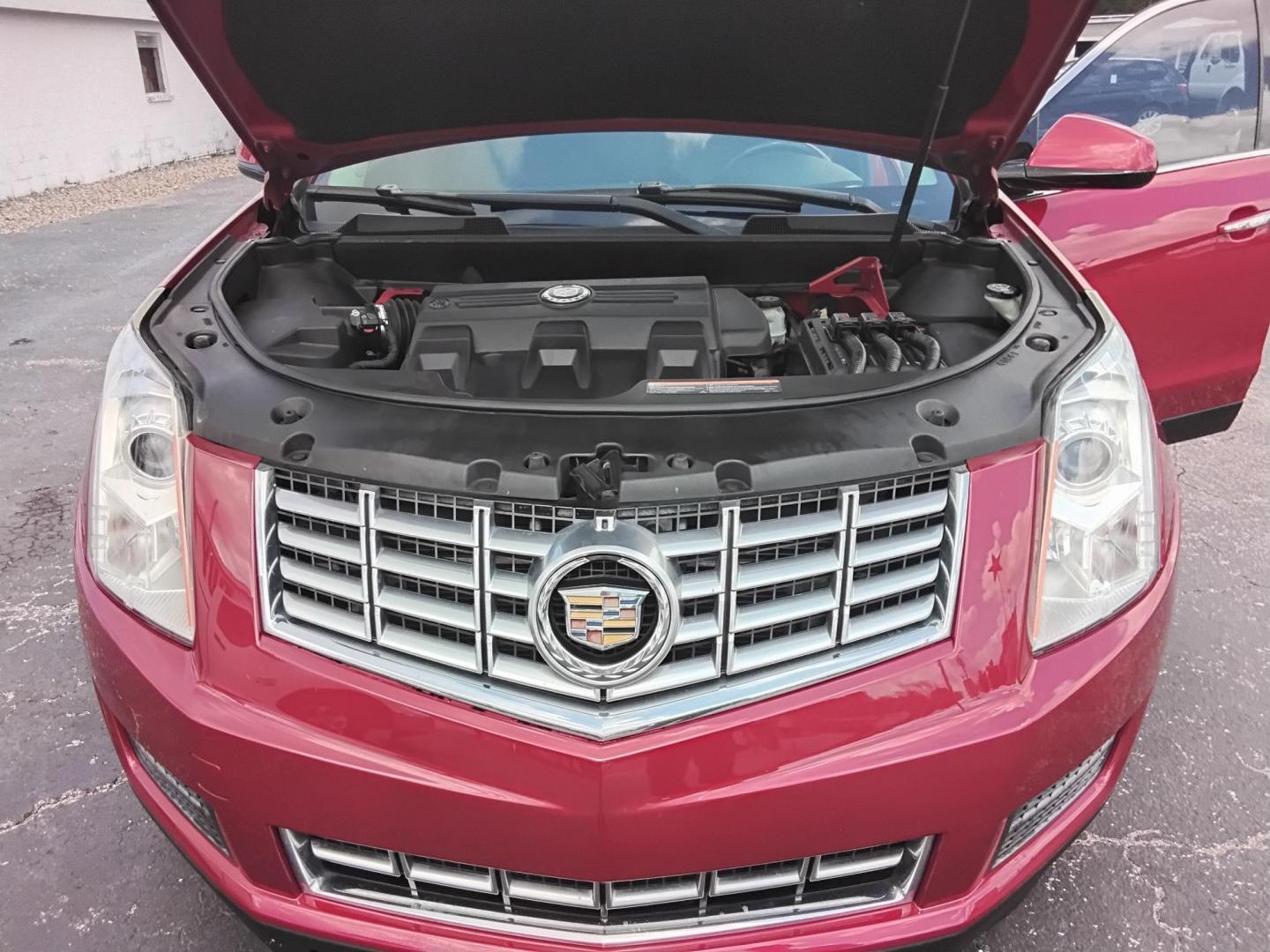 2015 RED /Grey Cadillac SRX Standard FWD (3GYFNAE3XFS) with an 3.6L V6 DOHC 24V FFV engine, 6-Speed Automatic transmission, located at 6112 N Florida Avenue, Tampa, FL, 33604, (888) 521-5131, 27.954929, -82.459534 - $499 down plus tax & tag. - Photo#5