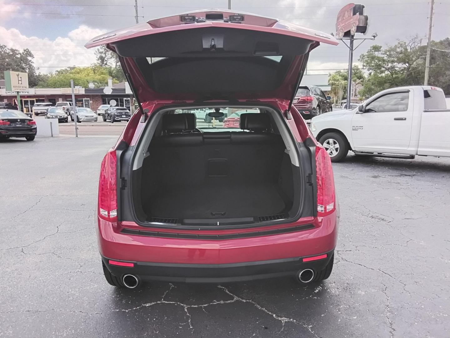 2015 RED /Grey Cadillac SRX Standard FWD (3GYFNAE3XFS) with an 3.6L V6 DOHC 24V FFV engine, 6-Speed Automatic transmission, located at 6112 N Florida Avenue, Tampa, FL, 33604, (888) 521-5131, 27.954929, -82.459534 - $499 down plus tax & tag. - Photo#4