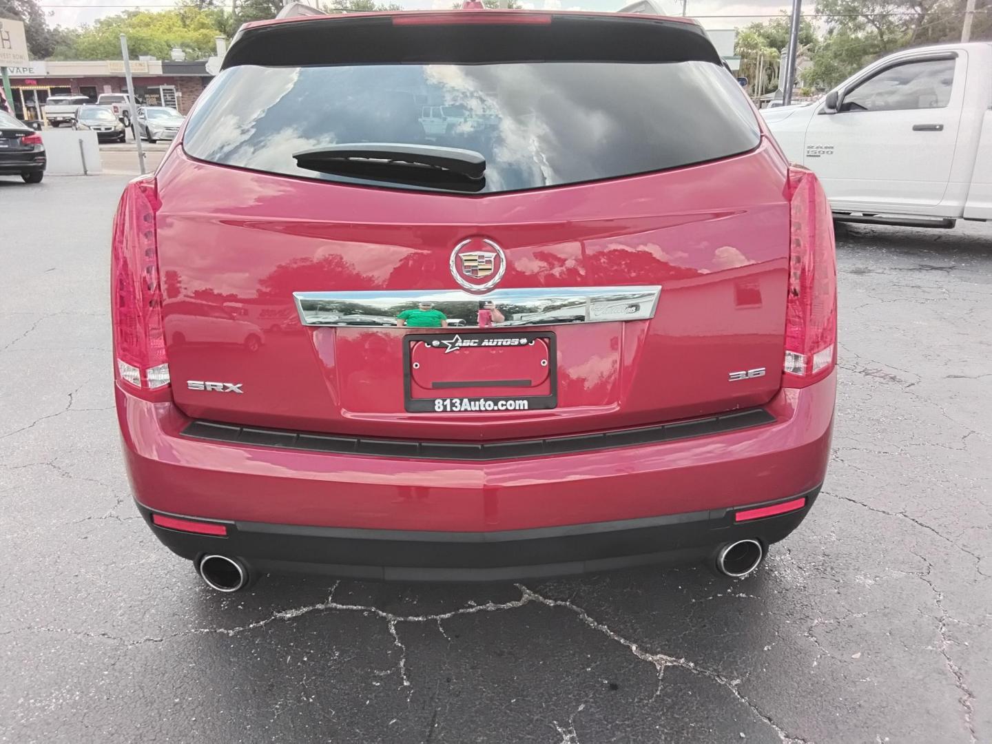 2015 RED /Grey Cadillac SRX Standard FWD (3GYFNAE3XFS) with an 3.6L V6 DOHC 24V FFV engine, 6-Speed Automatic transmission, located at 6112 N Florida Avenue, Tampa, FL, 33604, (888) 521-5131, 27.954929, -82.459534 - $499 down plus tax & tag. - Photo#3