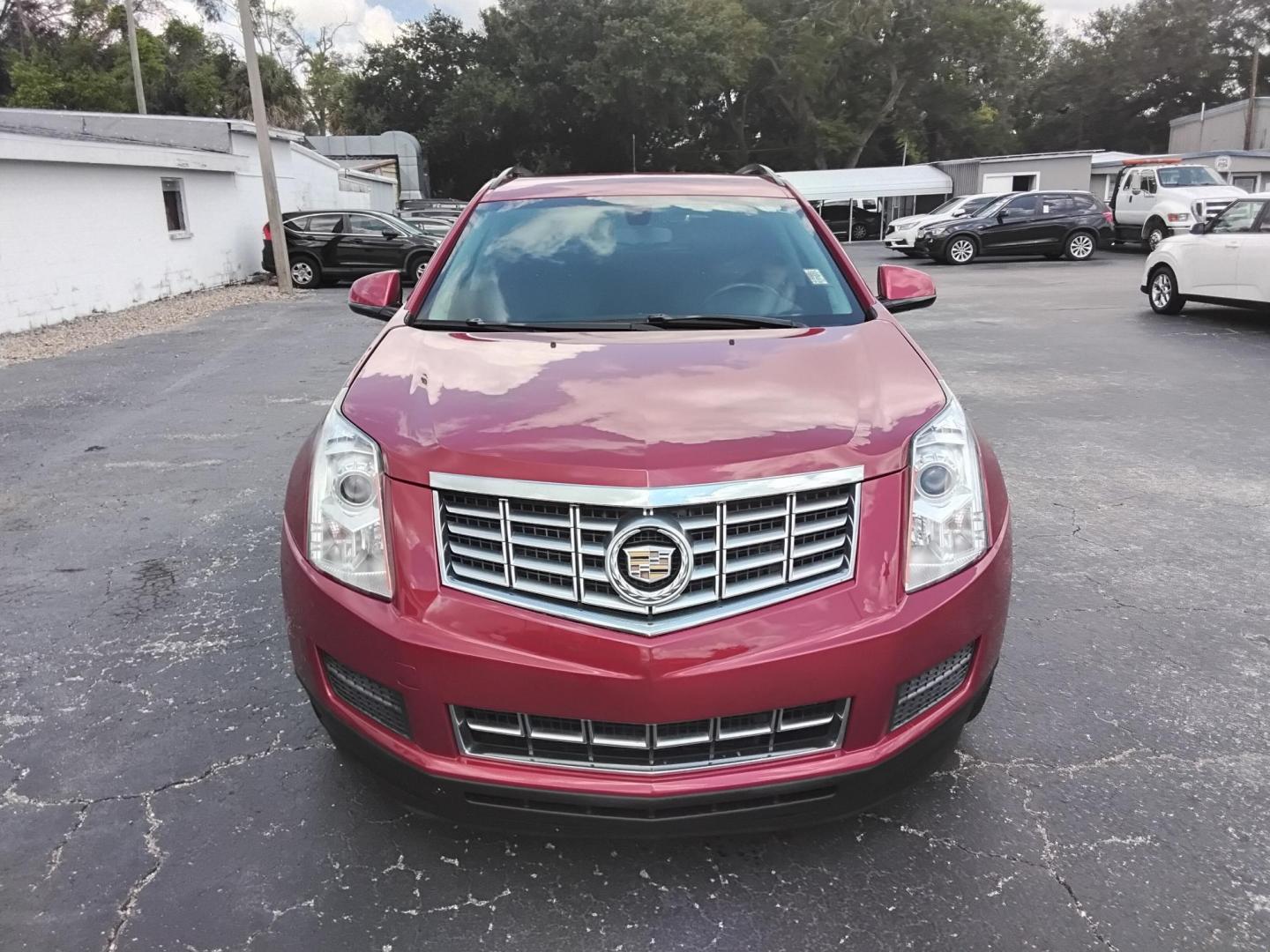 2015 RED /Grey Cadillac SRX Standard FWD (3GYFNAE3XFS) with an 3.6L V6 DOHC 24V FFV engine, 6-Speed Automatic transmission, located at 6112 N Florida Avenue, Tampa, FL, 33604, (888) 521-5131, 27.954929, -82.459534 - $499 down plus tax & tag. - Photo#1