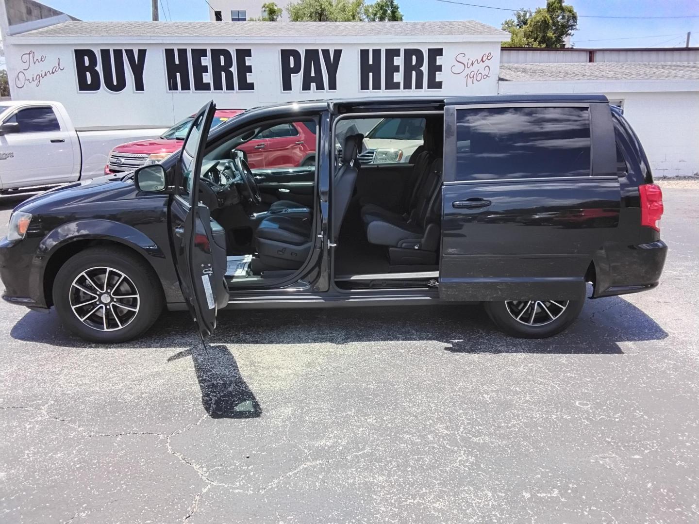 2016 BLACK /Grey Dodge Grand Caravan SXT (2C4RDGCG7GR) with an 3.6L V6 DOHC 24V engine, 6A transmission, located at 6112 N Florida Avenue, Tampa, FL, 33604, (888) 521-5131, 27.954929, -82.459534 - $499 down plus tax & tag.- Photo#1