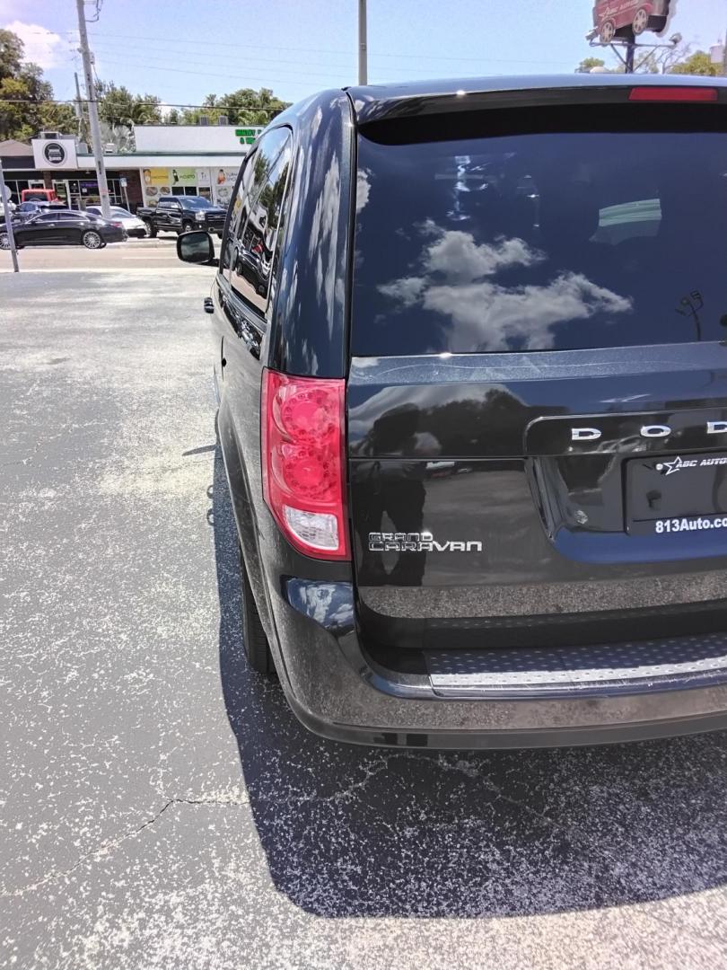 2016 BLACK /Grey Dodge Grand Caravan SXT (2C4RDGCG7GR) with an 3.6L V6 DOHC 24V engine, 6A transmission, located at 6112 N Florida Avenue, Tampa, FL, 33604, (888) 521-5131, 27.954929, -82.459534 - $499 down plus tax & tag.- Photo#9