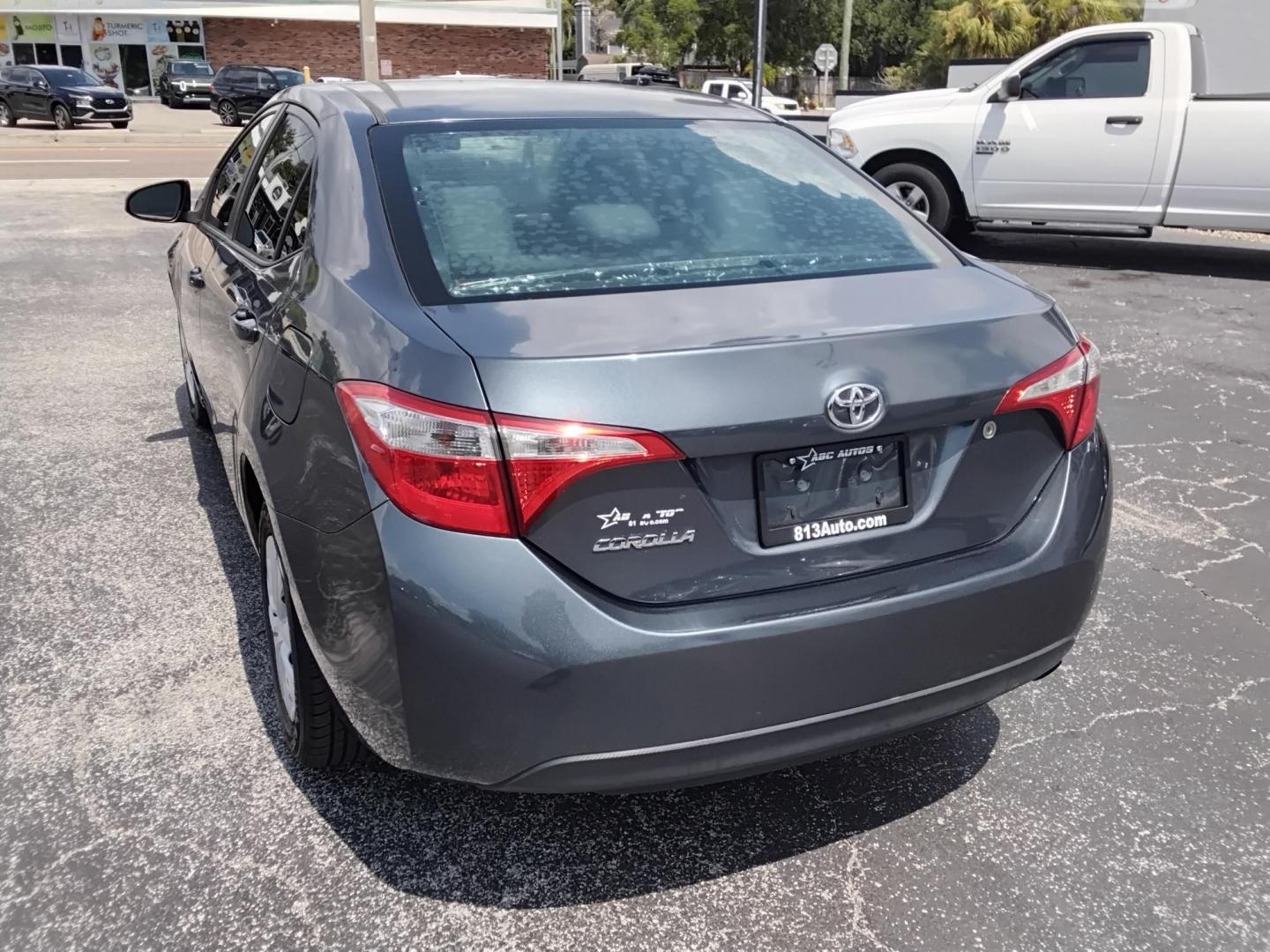 2015 Toyota Corolla L 4-Speed AT (2T1BURHE2FC) with an 1.8L L4 DOHC 16V engine, 4-Speed Automatic transmission, located at 6112 N Florida Avenue, Tampa, FL, 33604, (888) 521-5131, 27.954929, -82.459534 - $499 DOWN PLUS TAX & TAG.- Photo#6