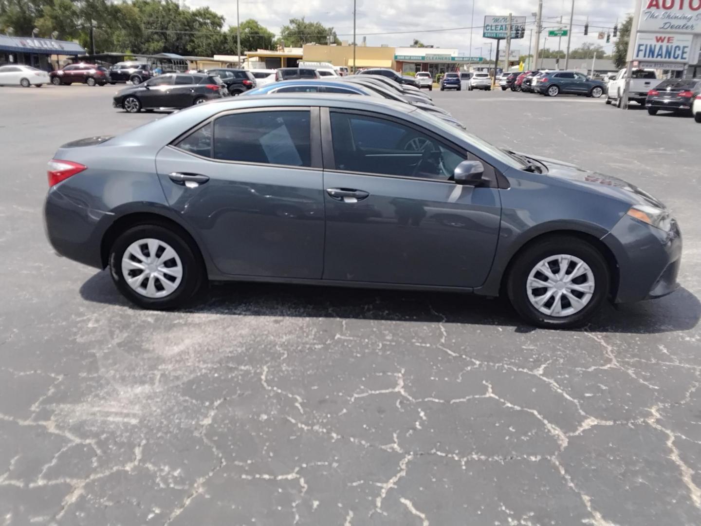 2015 Toyota Corolla L 4-Speed AT (2T1BURHE2FC) with an 1.8L L4 DOHC 16V engine, 4-Speed Automatic transmission, located at 6112 N Florida Avenue, Tampa, FL, 33604, (888) 521-5131, 27.954929, -82.459534 - $499 DOWN PLUS TAX & TAG.- Photo#4