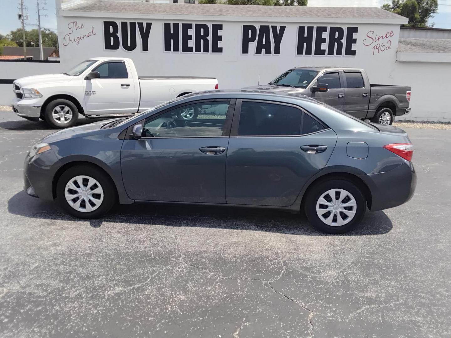 2015 Toyota Corolla L 4-Speed AT (2T1BURHE2FC) with an 1.8L L4 DOHC 16V engine, 4-Speed Automatic transmission, located at 6112 N Florida Avenue, Tampa, FL, 33604, (888) 521-5131, 27.954929, -82.459534 - $499 DOWN PLUS TAX & TAG.- Photo#0