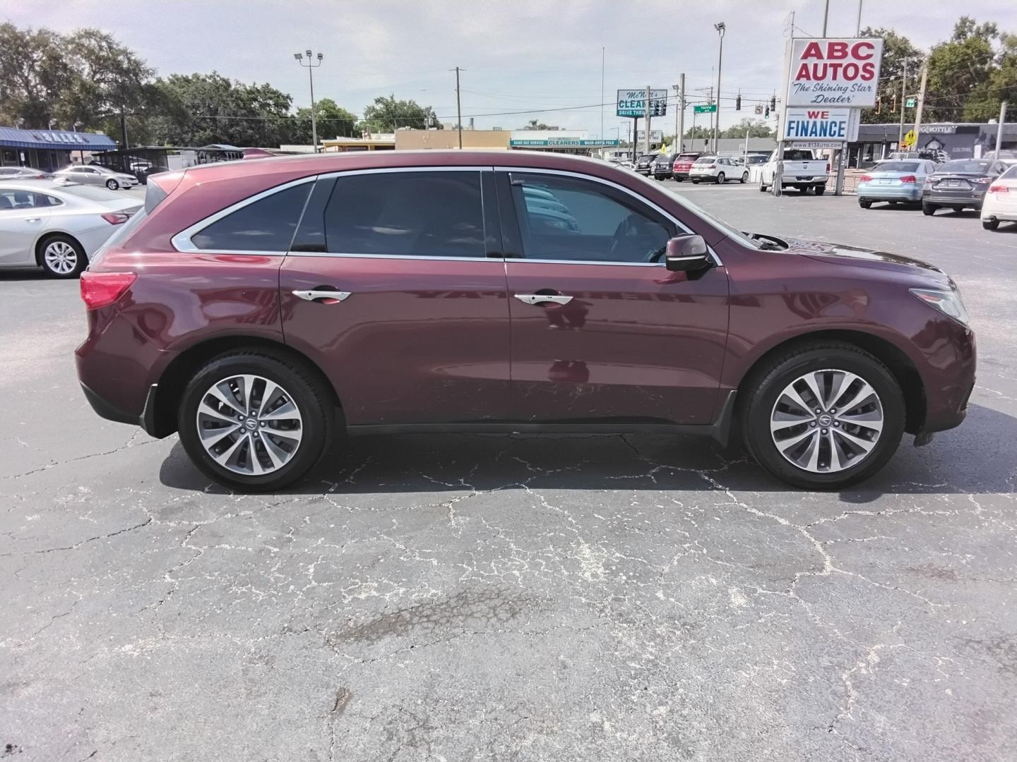 2015 RED /Beige Acura MDX 6-Spd AT w/Tech Package (5FRYD3H43FB) with an 3.5L V6 SOHC 24V engine, 6A transmission, located at 6112 N Florida Avenue, Tampa, FL, 33604, (888) 521-5131, 27.954929, -82.459534 - $499 DOWN PLUS TAX & TAG.- Photo#2
