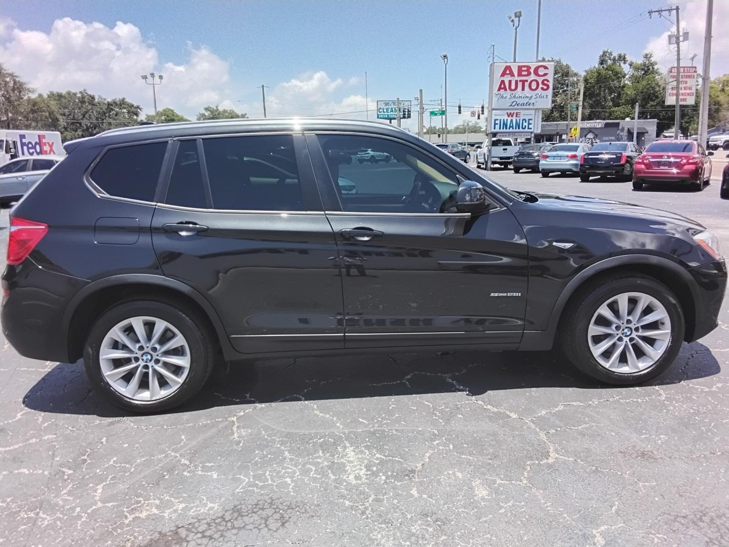 2017 BLACK /Beige BMW X3 sDrive28i (5UXWZ7C54H0) with an 2.0L L4 DOHC 16V engine, 8A transmission, located at 6112 N Florida Avenue, Tampa, FL, 33604, (888) 521-5131, 27.954929, -82.459534 - $499 down plus tax & tag.- Photo#4